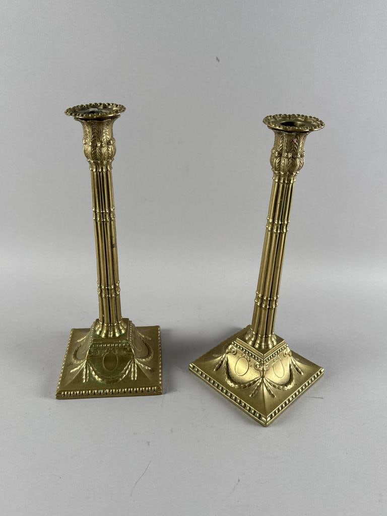 PAIR OF BRASS COLUMN-FORM CANDLESTICKS Early 20th Century or Earlier Heights 12.5". (1 of 3)