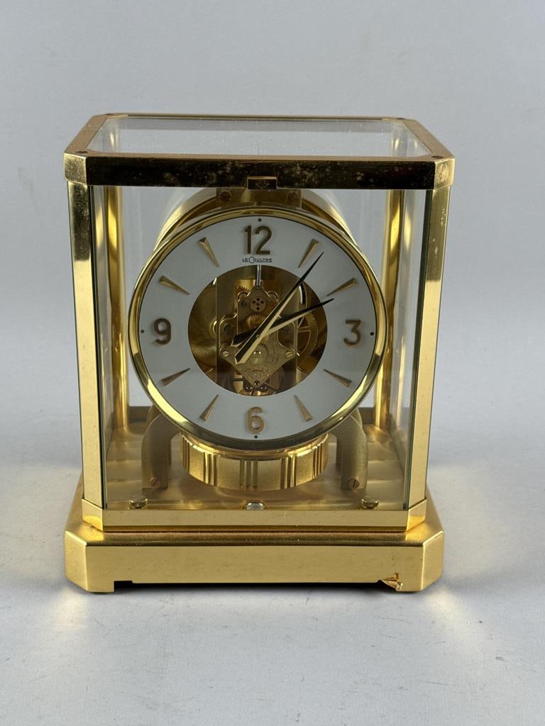 LECOULTRE ATMOS CLOCK Switzerland, Late 20th Century Height 9.5". Width 8.25". Depth 6.375".: LECOULTRE ATMOS CLOCKSwitzerland, Late 20th CenturySerial #351106. Fifteen-jewel movement. Brass case.Height 9.5". Width 8.25". Depth 6.375".