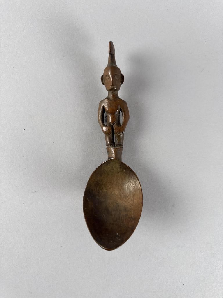 IFUGAO CARVED WOODEN CEREMONIAL SPOON The Philippines, 20th Century Length 8". Width 4". (1 of 3)