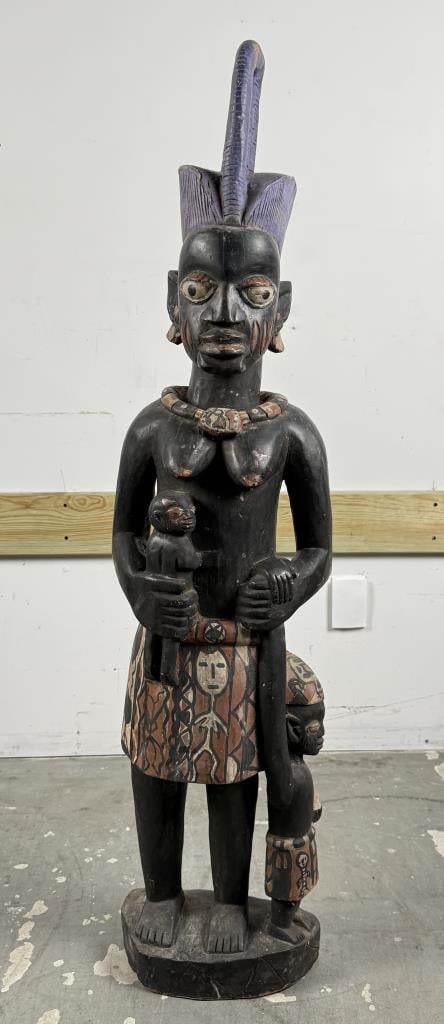 AFRICAN PAINTED AND CARVED WOODEN FIGURE OF A WOMAN AND HER CHILDREN 20th Century Height 52". Width (1 of 7)