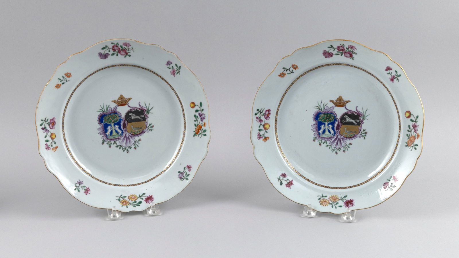 PAIR OF CHINESE EXPORT ARMORIAL PORCELAIN PLATES Late 18th Century Diameters 10". (1 of 2)