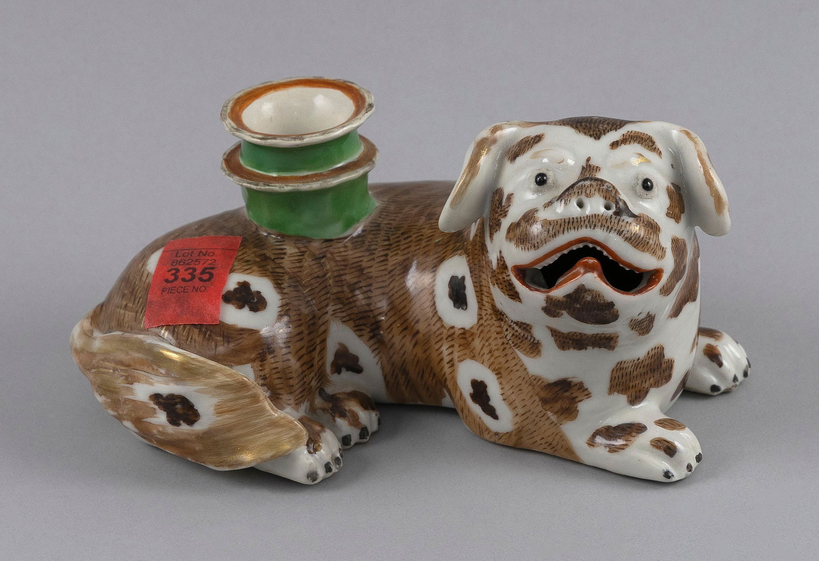 CHINESE POLYCHROME PORCELAIN FOO DOG JOSS STICK HOLDER Late 18th/Early 19th Century Height 3.25".: CHINESE POLYCHROME PORCELAIN FOO DOG JOSS STICK HOLDERLate 18th/Early 19th CenturyHeight 3.25". Length 6.5". Provenance:James Galley.