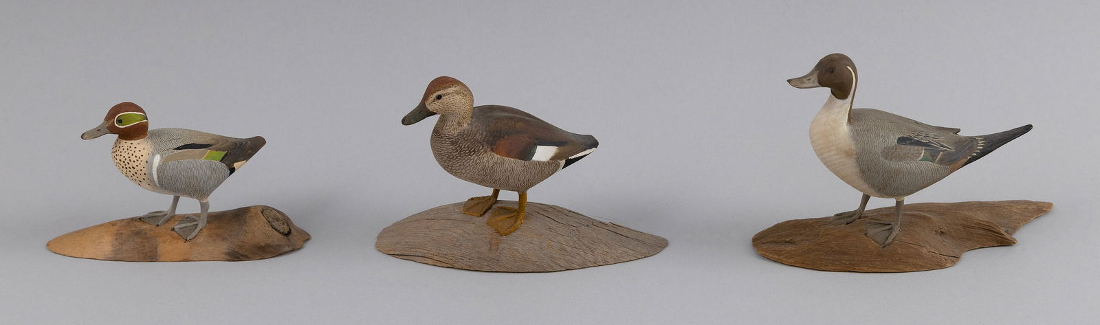 THREE HAROLD GIBBS MINIATURE PUDDLE DUCKS Barrington, Rhode Island, 1886-1970 Heights 2.25" and 3". (1 of 1)