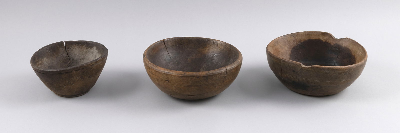 THREE TURNED WOODEN BOWLS Diameters from 6" to 7.75". (1 of 3)