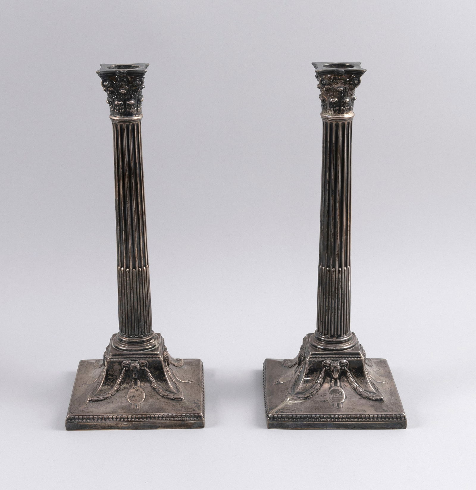 PAIR OF VICTORIA STERLING SILVER CORINTHIAN COLUMN CANDLESTICKS London, 1854 Heights 12.5". (1 of 3)