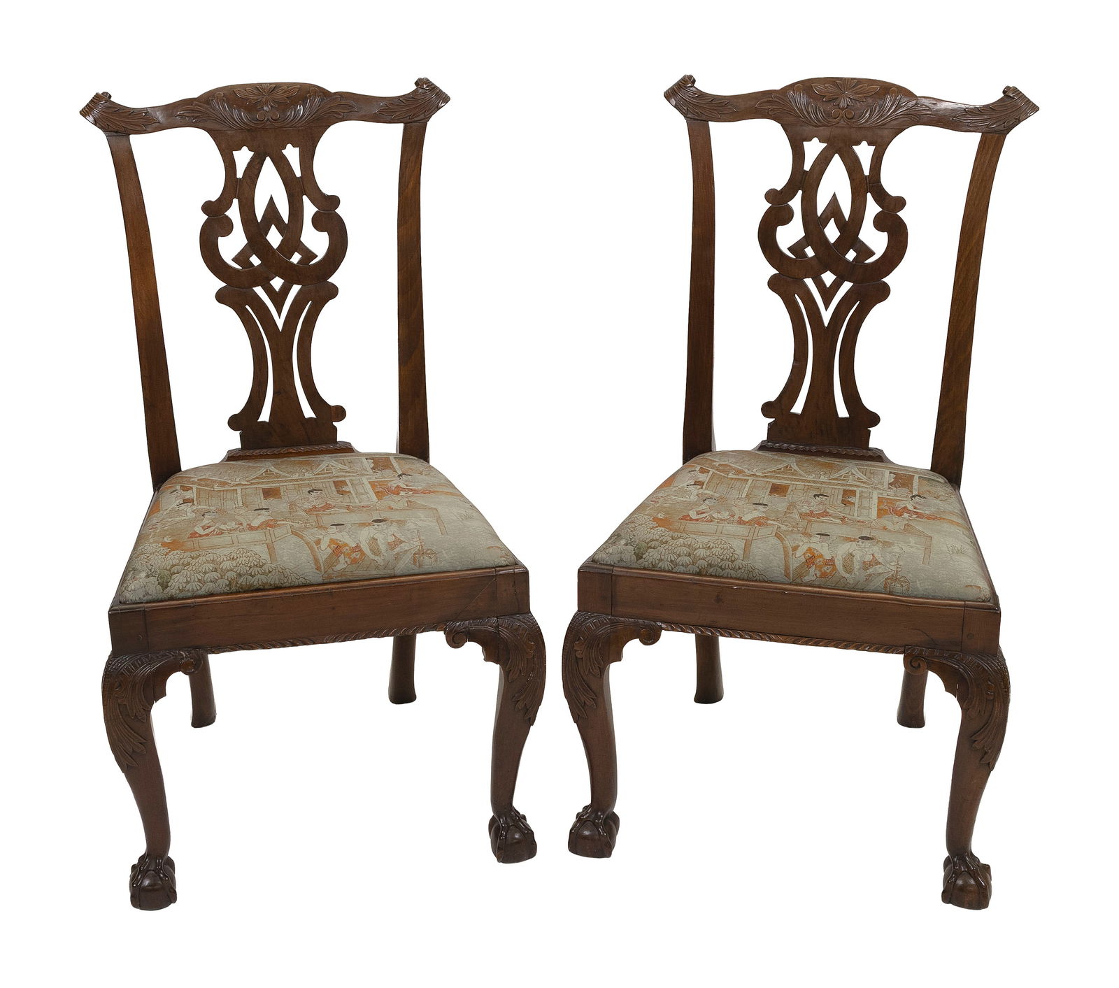 PAIR OF CHIPPENDALE MAHOGANY SIDE CHAIRS Probably Boston, Circa 1780 Back heights 38.5". Seat: PAIR OF CHIPPENDALE MAHOGANY SIDE CHAIRSProbably Boston, Circa 1780Cupid's-bow crest rails with foliate-carved ears and similar leaves and a flower blossom at the centers. Pierced back splats. Slip se