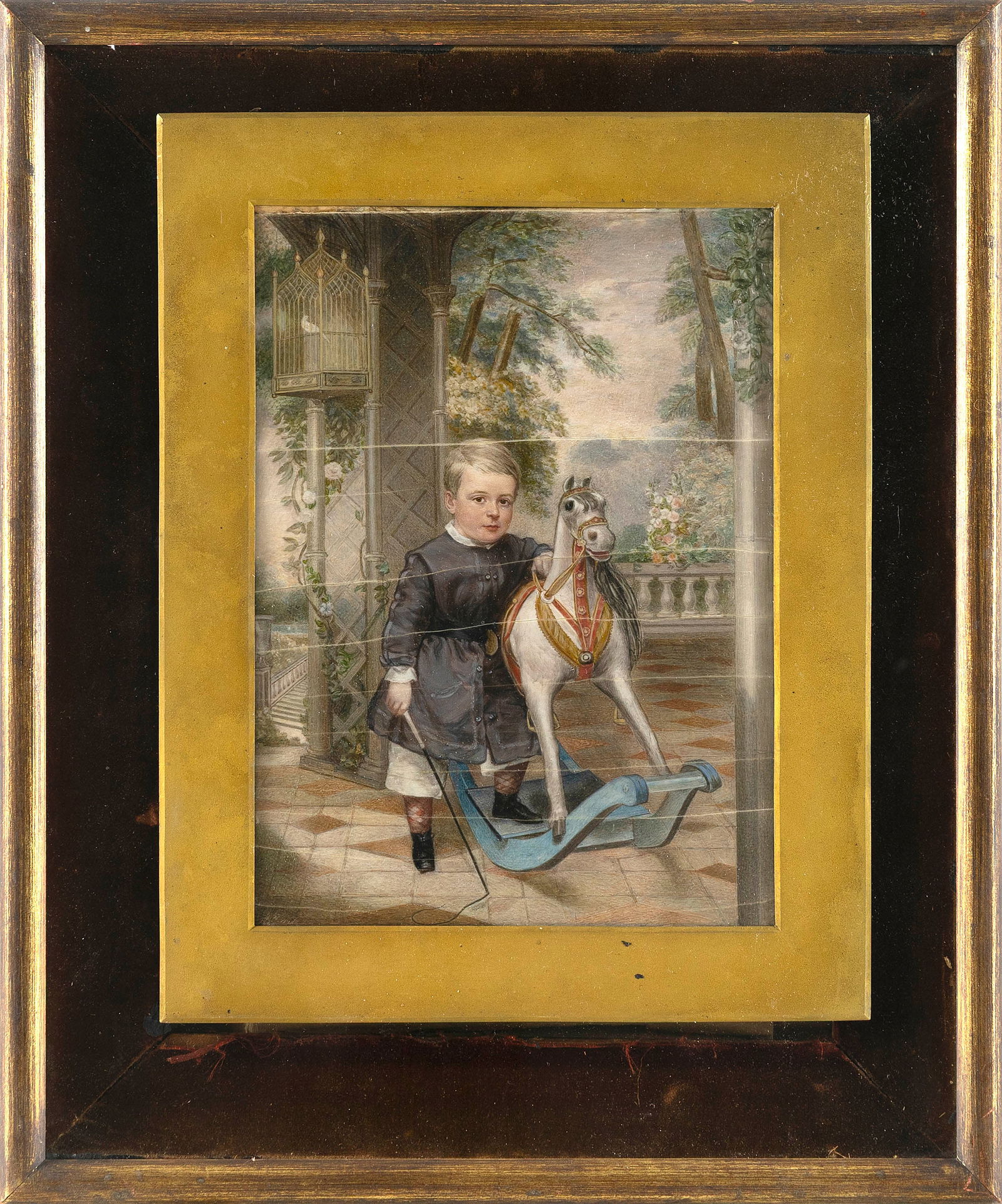AMERICAN OR ENGLISH SCHOOL (19th Century,), Young boy with his rocking horse on a flower-filled: AMERICAN OR ENGLISH SCHOOL19th CenturyYoung boy with his rocking horse on a flower-filled porch. Signed illegibly in lower left.Watercolor on panel, 8.5" x 6" sight. Framed 14.25" x 12".