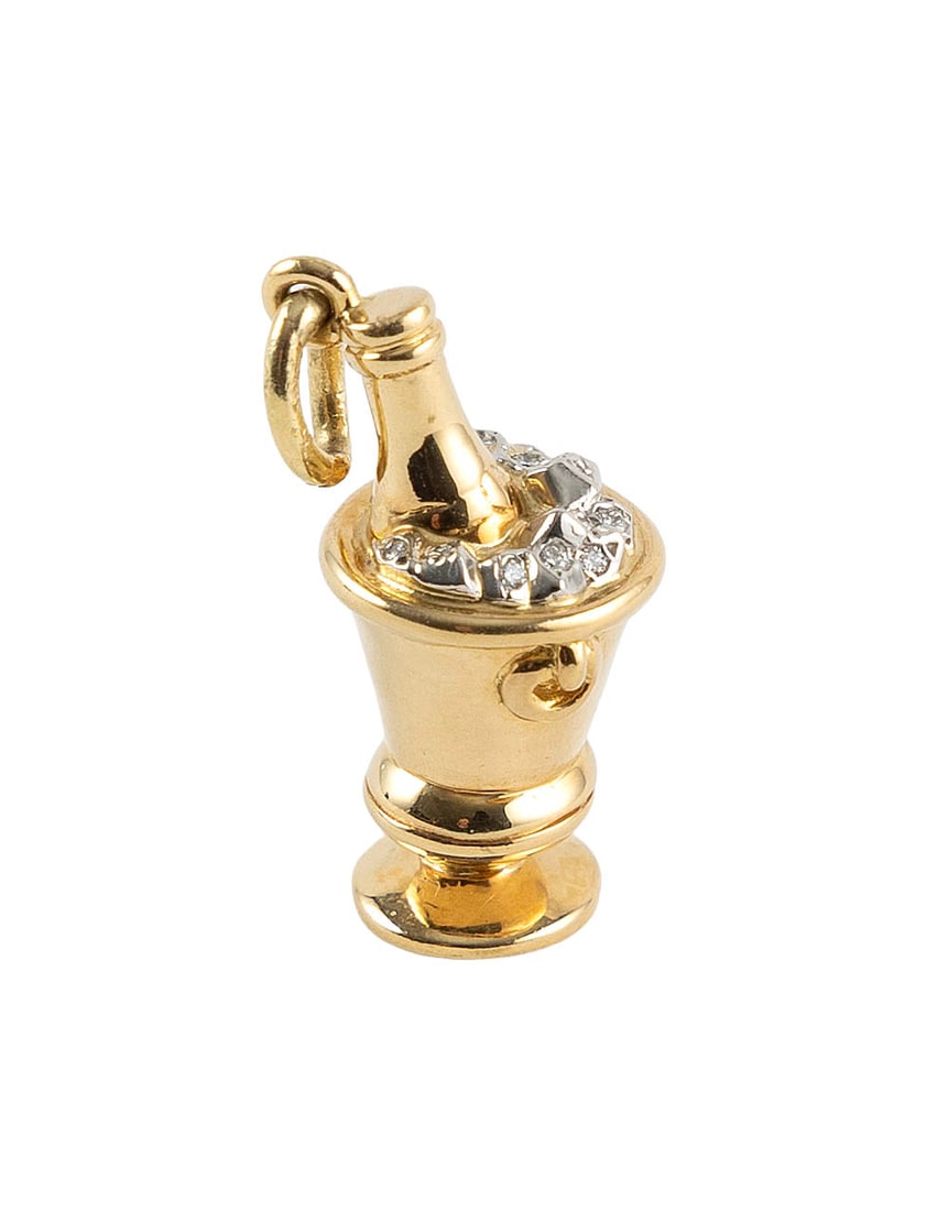 TIFFANY & CO. 18KT YELLOW GOLD, PLATINUM AND DIAMOND CHAMPAGNE BUCKET CHARM/PENDANT Approx. 5.8: TIFFANY & CO. 18KT YELLOW GOLD, PLATINUM AND DIAMOND CHAMPAGNE BUCKET CHARM/PENDANT12 small round-cut diamonds. Stamped. Approx. 10.0 x 22.0mm.Approx. 5.8 total dwt.