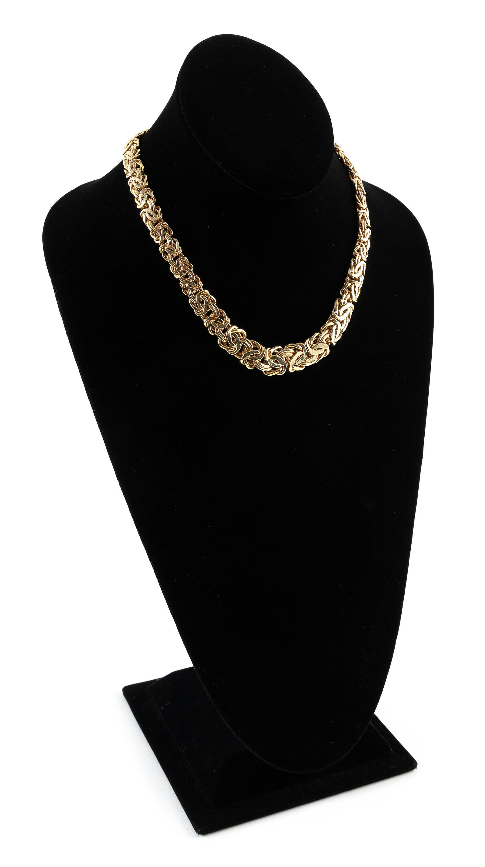 14KT YELLOW GOLD FLEXIBLE LINK NECKLACE Approx. 19.0 total dwt.: 14KT YELLOW GOLD FLEXIBLE LINK NECKLACELobster claw clasp. Stamped "14k Italy". Width tapers from approx. 15.0 to 10.0mm. Length 17.5".Approx. 19.0 total dwt.