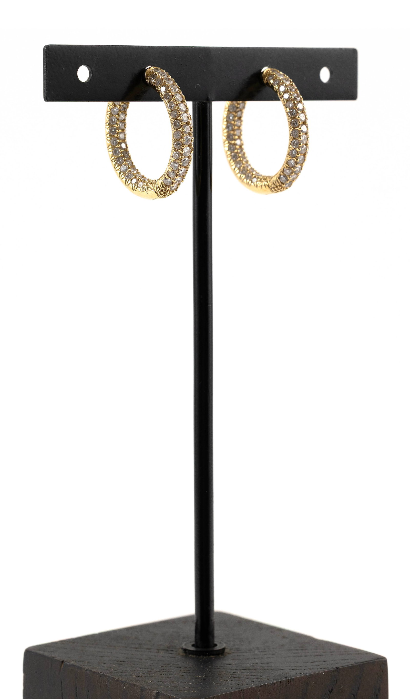 PAIR OF 18KT YELLOW GOLD AND DIAMOND HOOP EARRINGS Approx. 7.7 total dwt.: PAIR OF 18KT YELLOW GOLD AND DIAMOND HOOP EARRINGSEach with 75 small round-cut diamonds, approx. 1.50 ctw. Hinged with post. Stamped. Approx. 4.0 x 22.0mm.Approx. 7.7 total dwt.