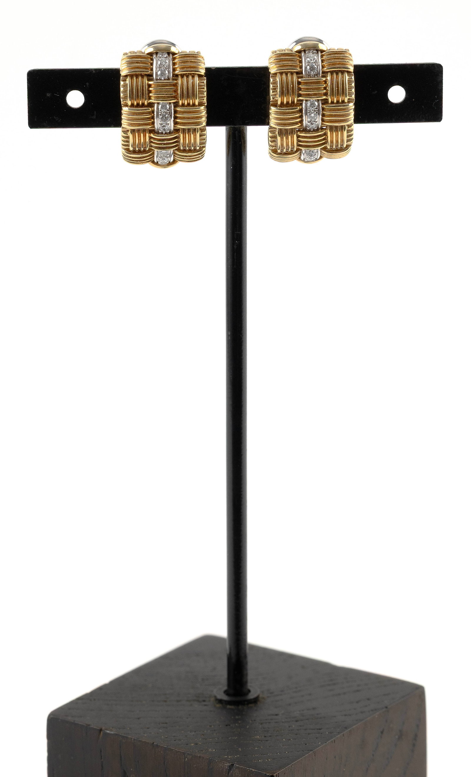 PAIR OF 18KT YELLOW AND WHITE GOLD AND DIAMOND EARRINGS Approx. 12.9 total dwt.: PAIR OF 18KT YELLOW AND WHITE GOLD AND DIAMOND EARRINGSIn basket weave design. Each with three rows of three small round-cut diamonds, approx. 0.27 ctw. Hinged clip backs. Stamped "18k Italy". Approx.