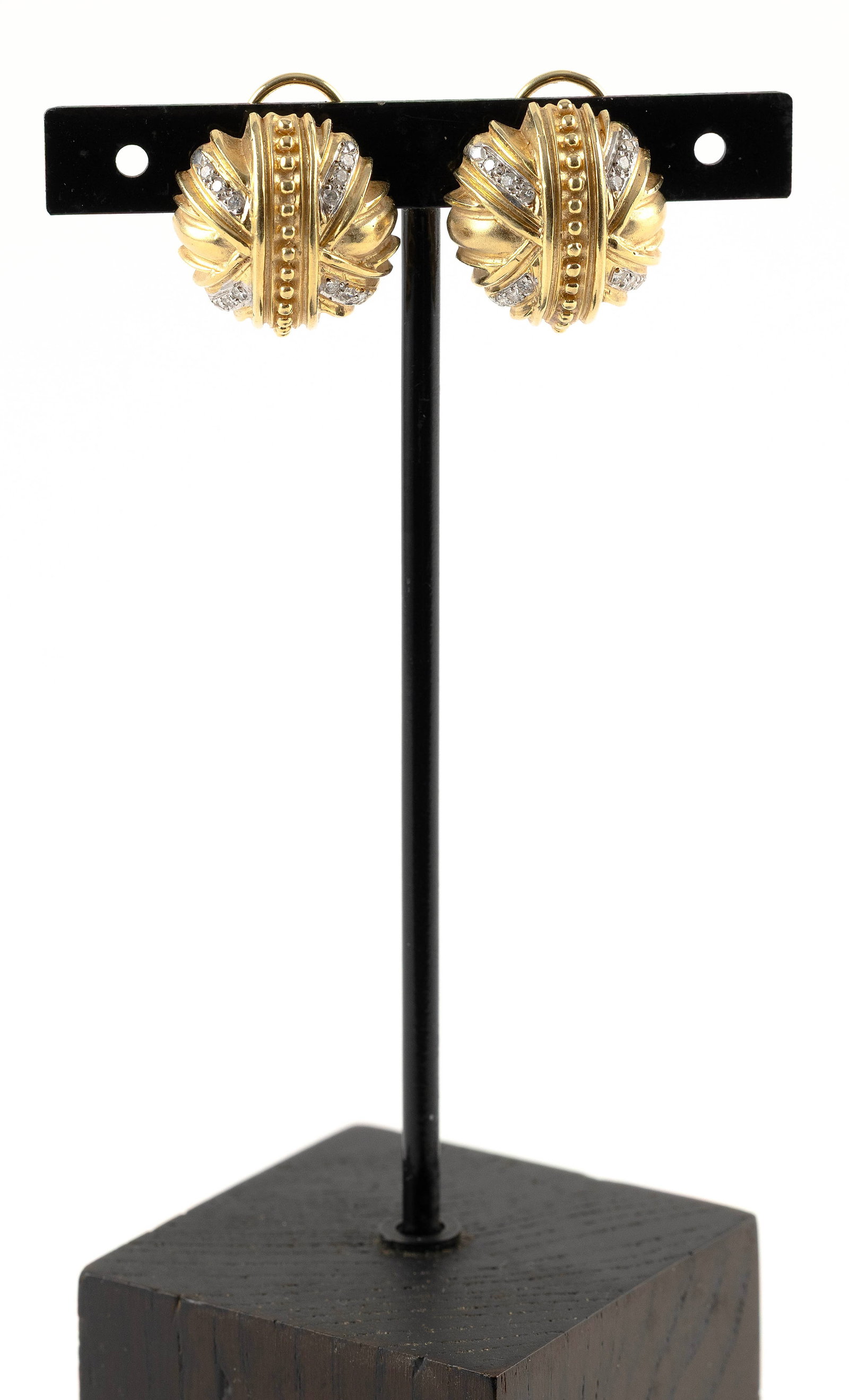 PAIR OF 18KT YELLOW GOLD AND DIAMOND EARRINGS Approx. 13.0 total dwt.: PAIR OF 18KT YELLOW GOLD AND DIAMOND EARRINGSEach with 12 small round-cut diamonds, approx. 0.50 ctw. Omega post backs. Stamped. Approx. 20.0 x 22.0mm.Approx. 13.0 total dwt.