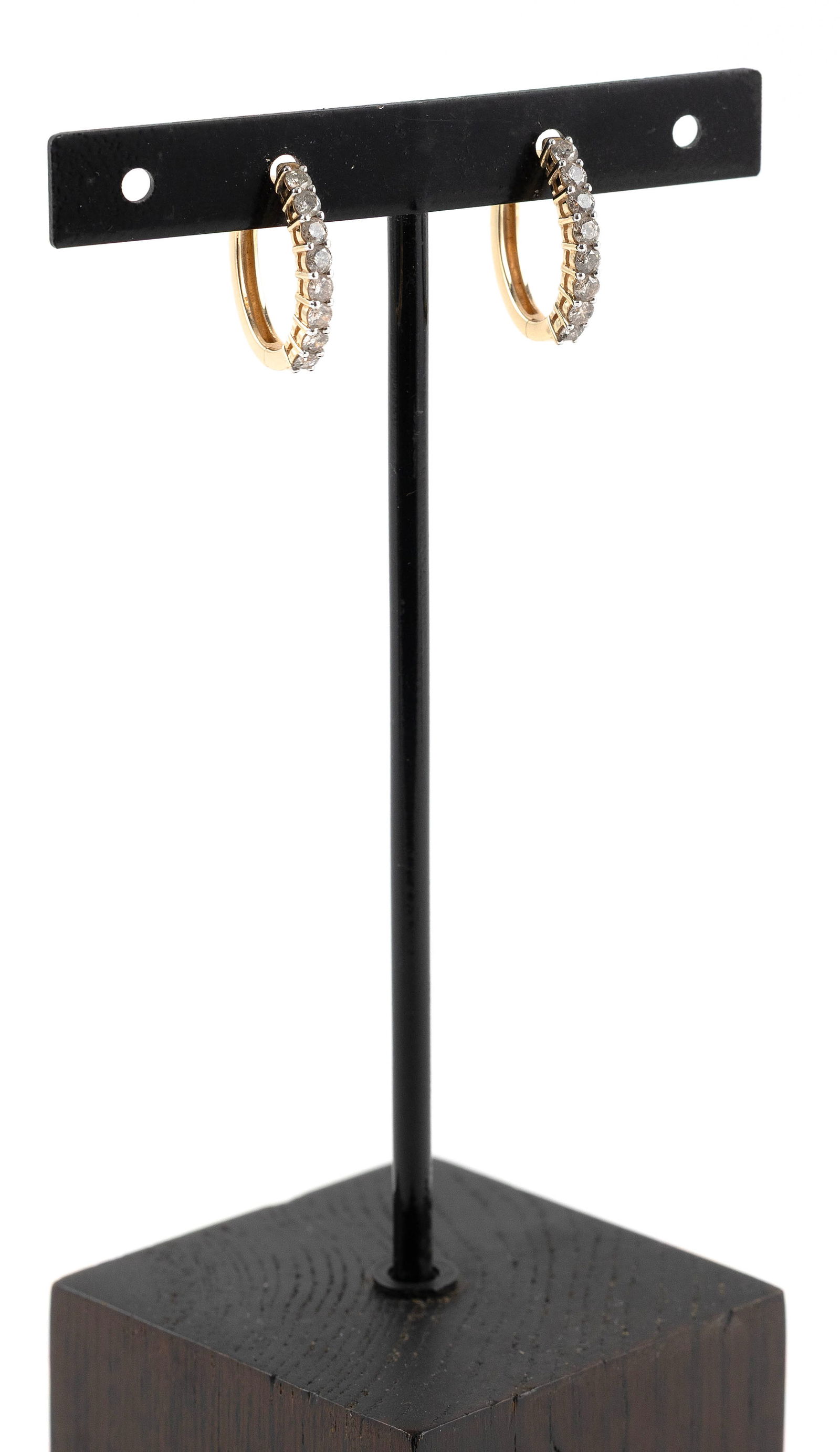 PAIR OF 14KT YELLOW GOLD AND DIAMOND EARRINGS Approx. 2.5 total dwt.: PAIR OF 14KT YELLOW GOLD AND DIAMOND EARRINGSEach with eight small round-cut diamonds, approx. 0.75 ctw. Hinged with snap post. Stamped. Approx. 2.5 x 16.0 x 18.0mm.Approx. 2.5 total dwt.