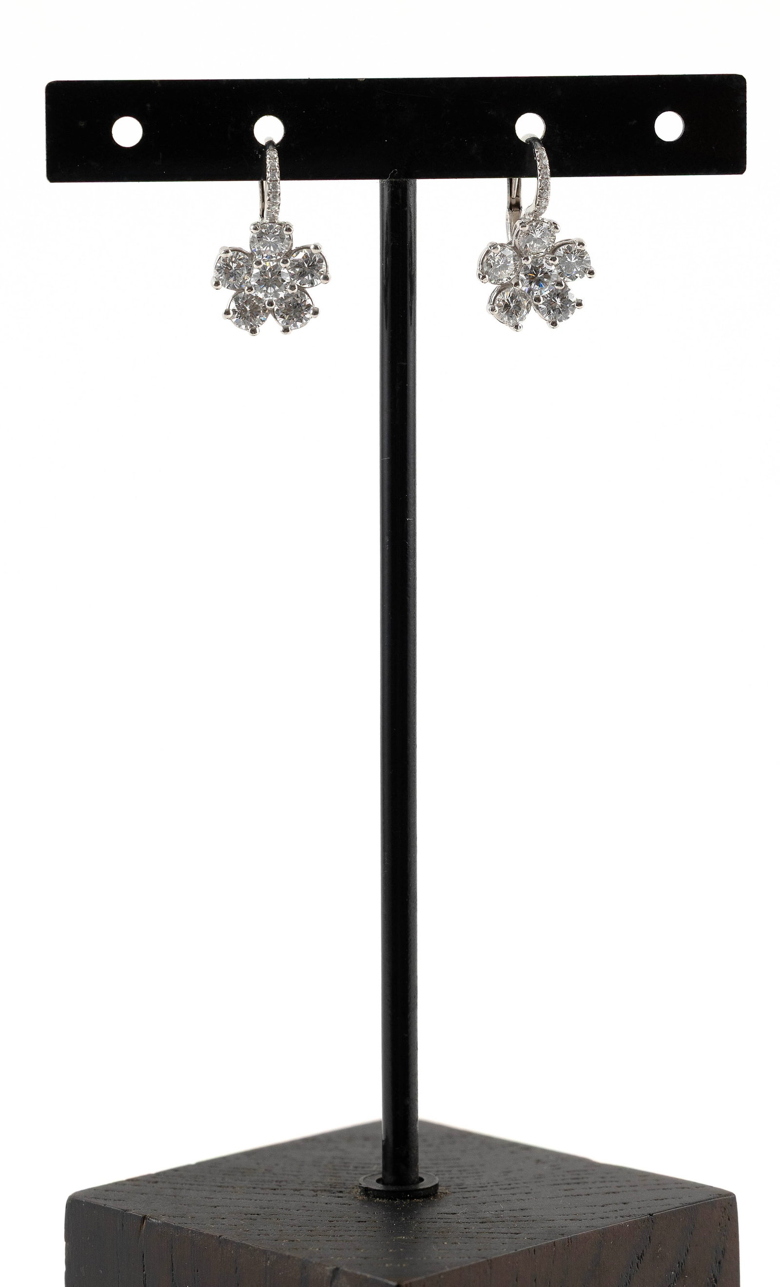 PAIR OF PLATINUM AND DIAMOND EARRINGS Approx. 4.1 total dwt.: PAIR OF PLATINUM AND DIAMOND EARRINGSEach with six round-cut diamonds in a cluster design and seven small diamonds on the hook. Diamonds approx. 2.00 ctw. Hinged level backs. Stamped. Diameter approx.