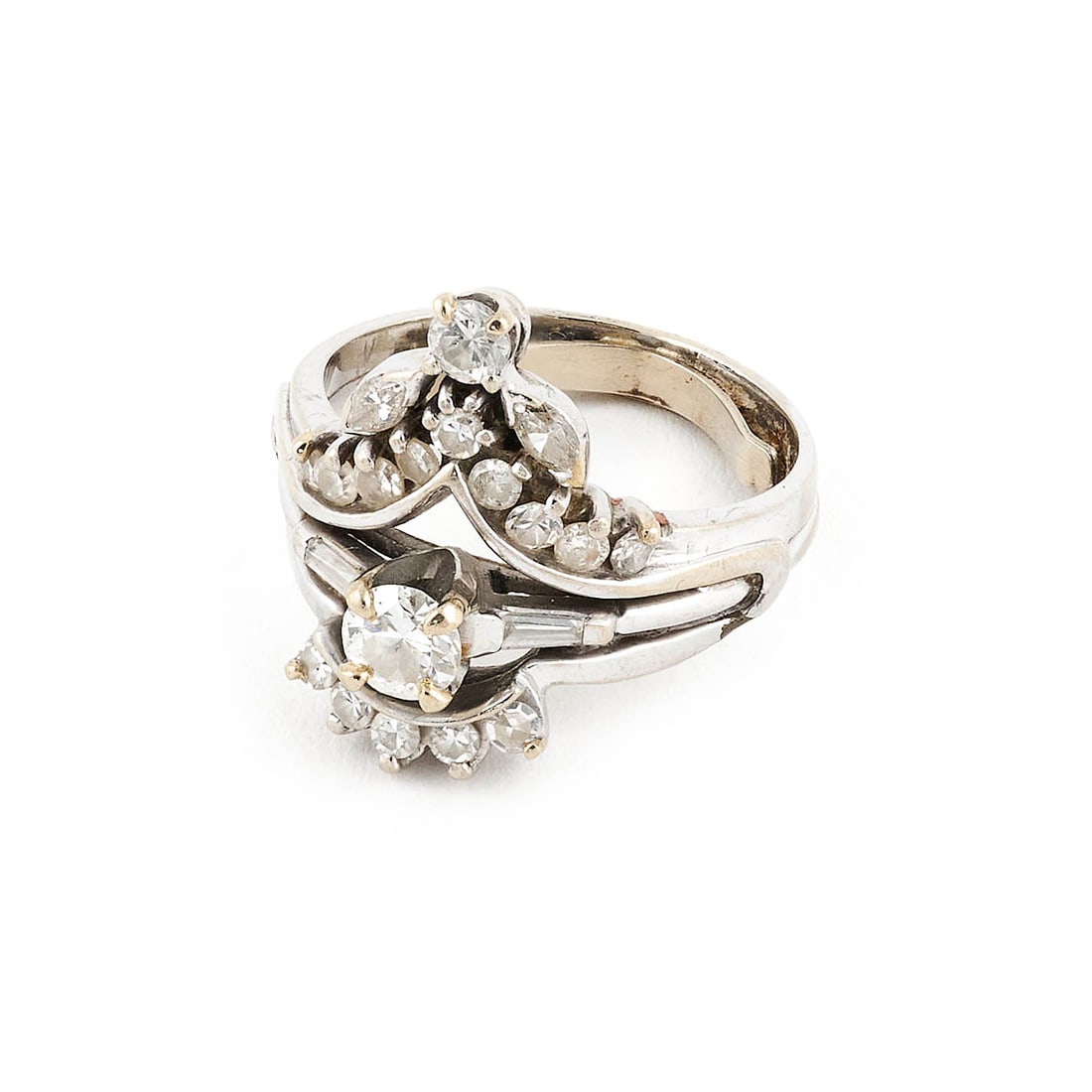 14KT WHITE GOLD WEDDING SET Approx. 5.0 total dwt.: 14KT WHITE GOLD WEDDING SETA diamond engagement ring and a diamond ring jacket soldered together with spring sizer. Engagement ring with one approx. 0.33 ct. diamond, approx. VS1 clarity, H-I color, a