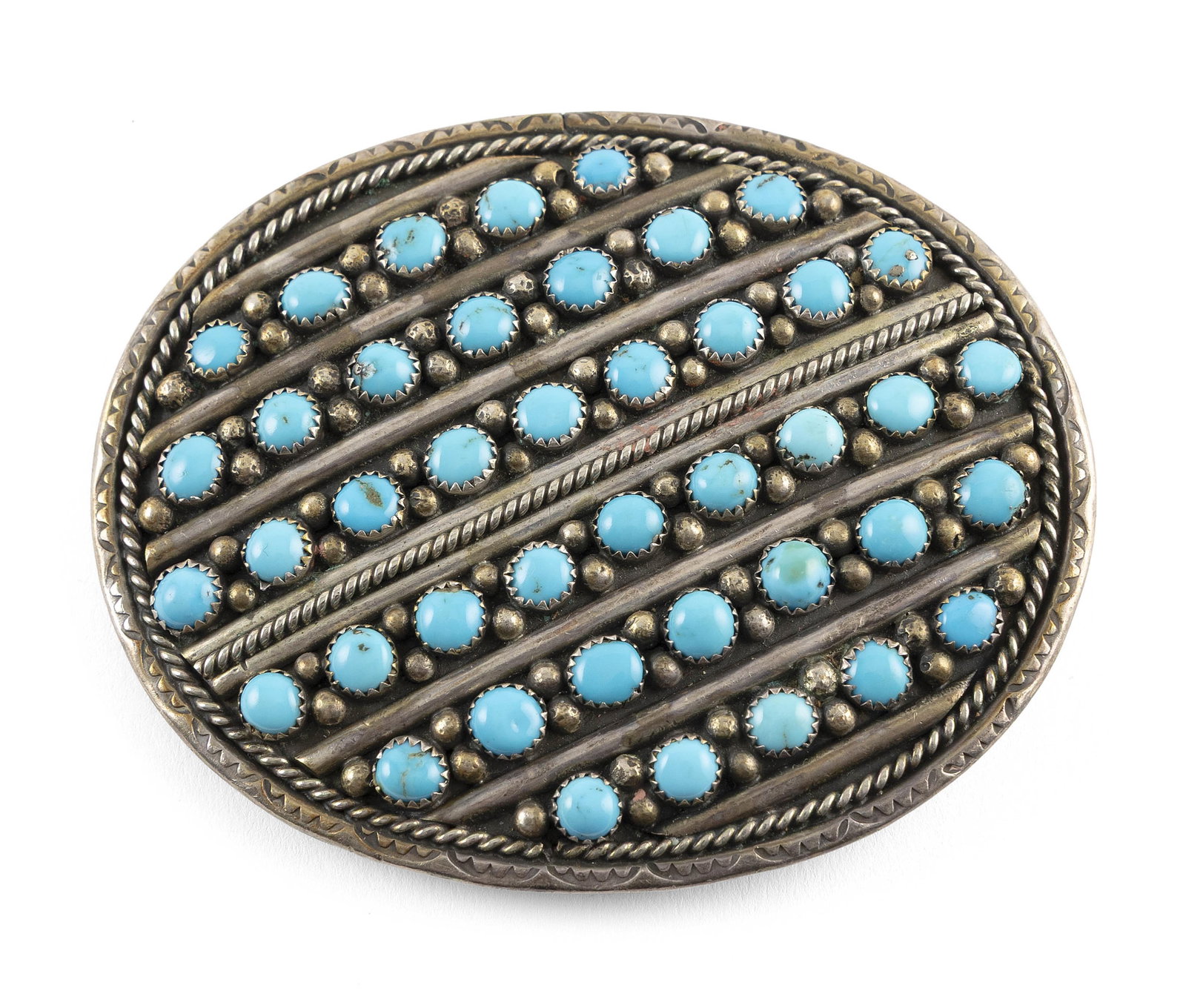 RICHARD BEGAY NAVAJO STERLING SILVER AND TURQUOISE BELT BUCKLE Late 20th Century Approx. 163 grams: RICHARD BEGAY NAVAJO STERLING SILVER AND TURQUOISE BELT BUCKLELate 20th CenturySix rows of small round polished turquoise spaced with silver raindrop balls within a rope border. Double stamped maker?s