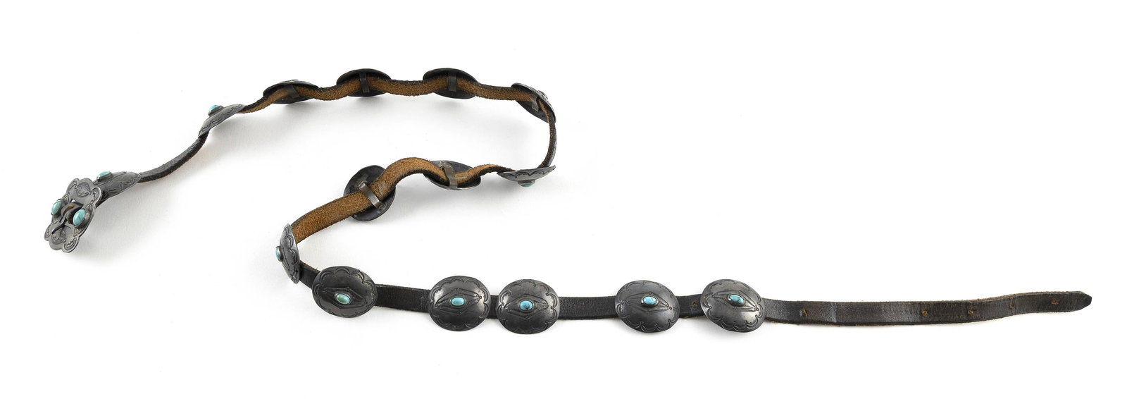 NAVAJO SILVER AND TURQUOISE LADY'S CONCHO BELT Mid-20th Century: NAVAJO SILVER AND TURQUOISE LADY'S CONCHO BELTMid-20th CenturyBuckle and 151 conchos, each approx. 1.125" x .875", with stamped designs and a small oval turquoise. Unsigned. Length approx. 32".
