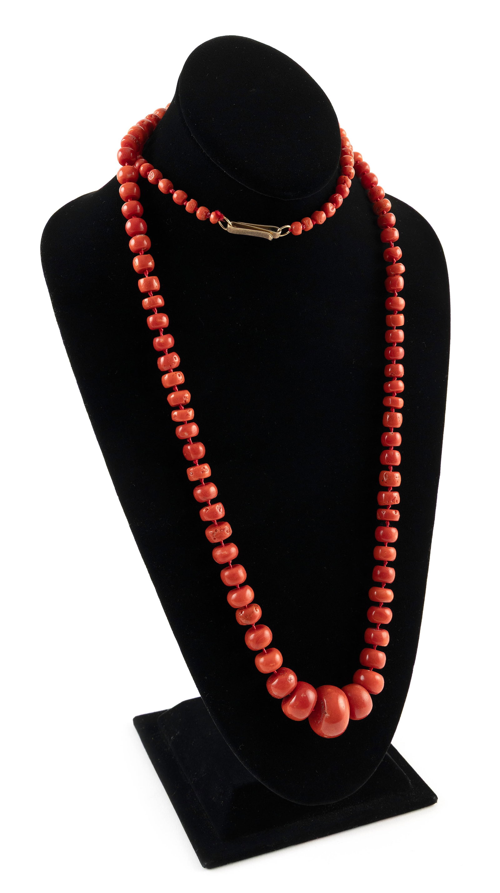 CHINESE RED CORAL BEADED NECKLACE Length 20".: CHINESE RED CORAL BEADED NECKLACEGraduated beads. 14kt gold clasp.Length 20".