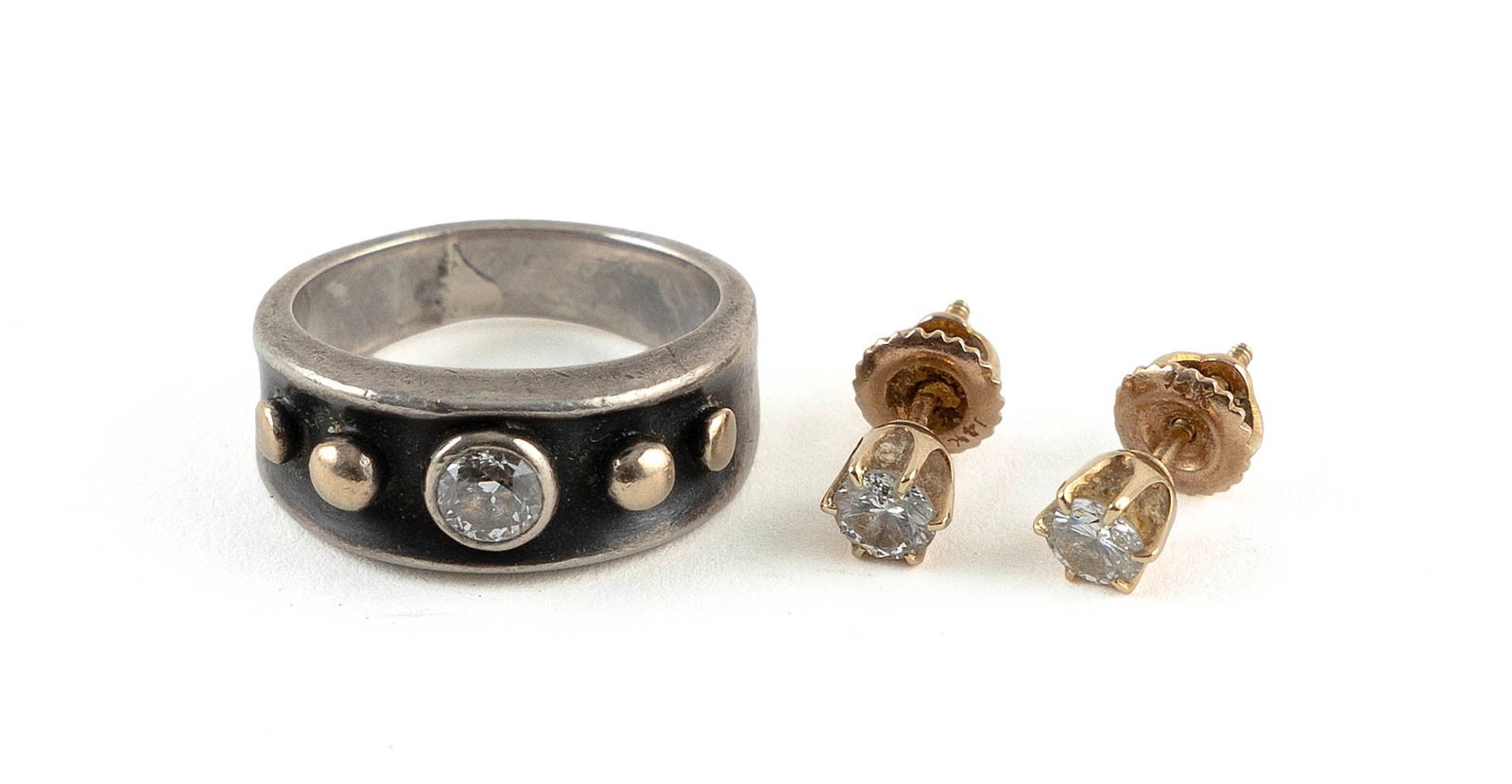 THREE PIECES OF 14KT GOLD AND DIAMOND JEWELRY Approx. 4.9 total dwt.: THREE PIECES OF 14KT GOLD AND DIAMOND JEWELRY1-2) Pair of 14kt yellow gold and diamond earrings, approx. 0.50 ctw, approx. SI3 clarity, I-J color. Post with screw backs.3) 14kt white and yellow gold r