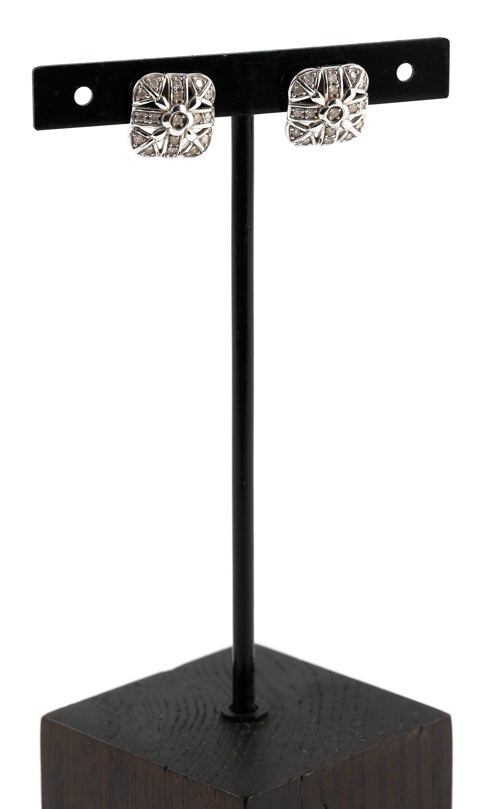 PAIR OF 14KT WHITE GOLD AND DIAMOND EARRINGS Approx. 3.7 total dwt.: PAIR OF 14KT WHITE GOLD AND DIAMOND EARRINGSEach with 17 small round-cut diamonds, approx. 0.33 ctw. Post backs. Stamped "14k Thailand". Approx. 14.0 x 14.0mm.Approx. 3.7 total dwt.