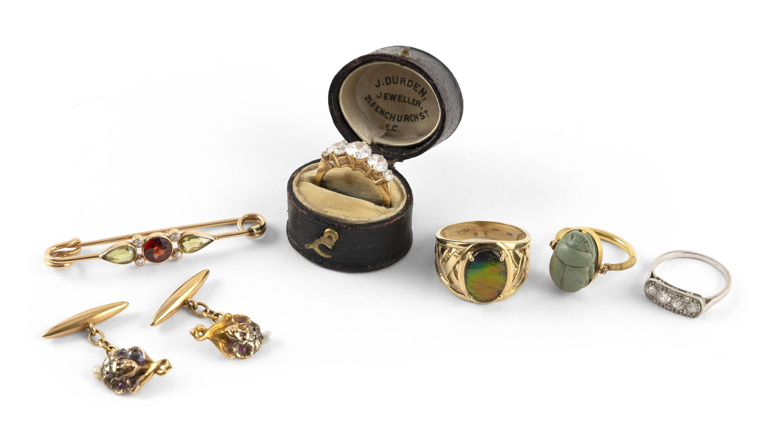 SEVEN PIECES OF GOLD, PLATINUM AND MIXED STONE JEWELRY 14kt approx. 12.1 dwt., 10kt approx. 4.4 dwt.: SEVEN PIECES OF GOLD, PLATINUM AND MIXED STONE JEWELRY1) Platinum and diamond ring with ten old mine-cut diamonds, approx. 0.50 ctw. Size 5?.2) 14kt yellow gold ring with one approx. 10.0 x 15.0mm car