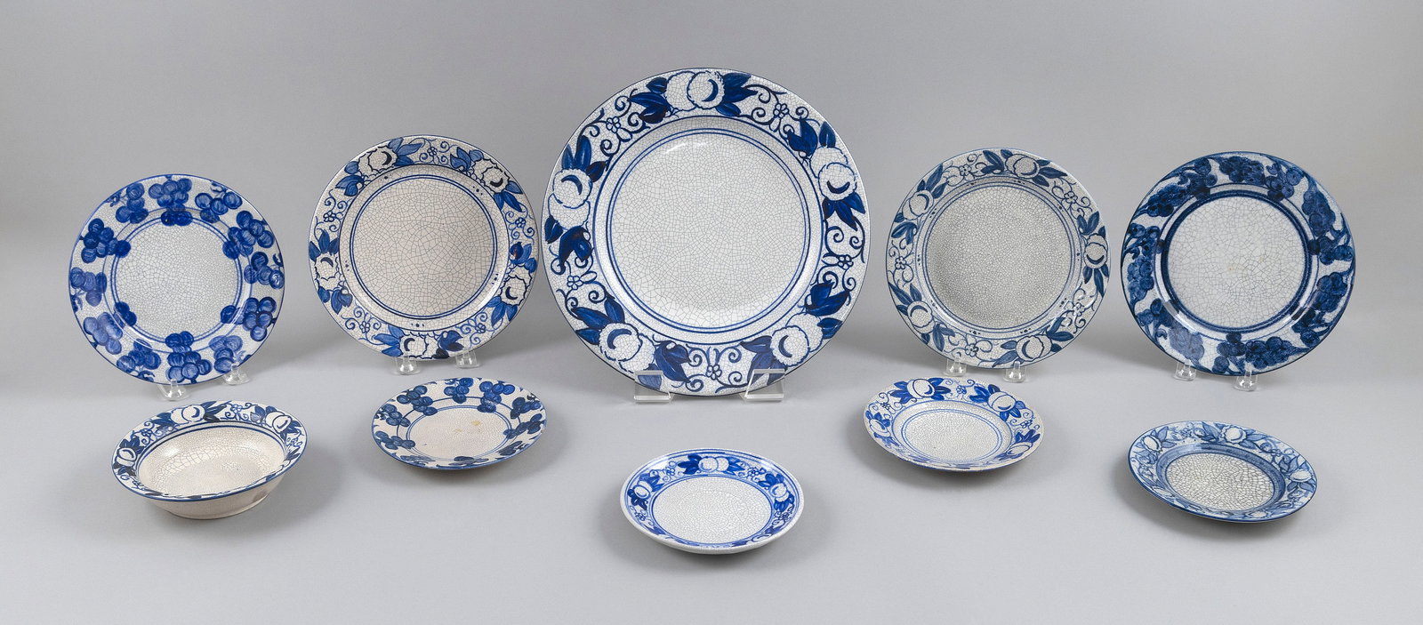 NINE DEDHAM POTTERY PLATES AND A SHALLOW BOWL Dedham, Massachusetts, Late 19th/Early 20th Century (1 of 2)