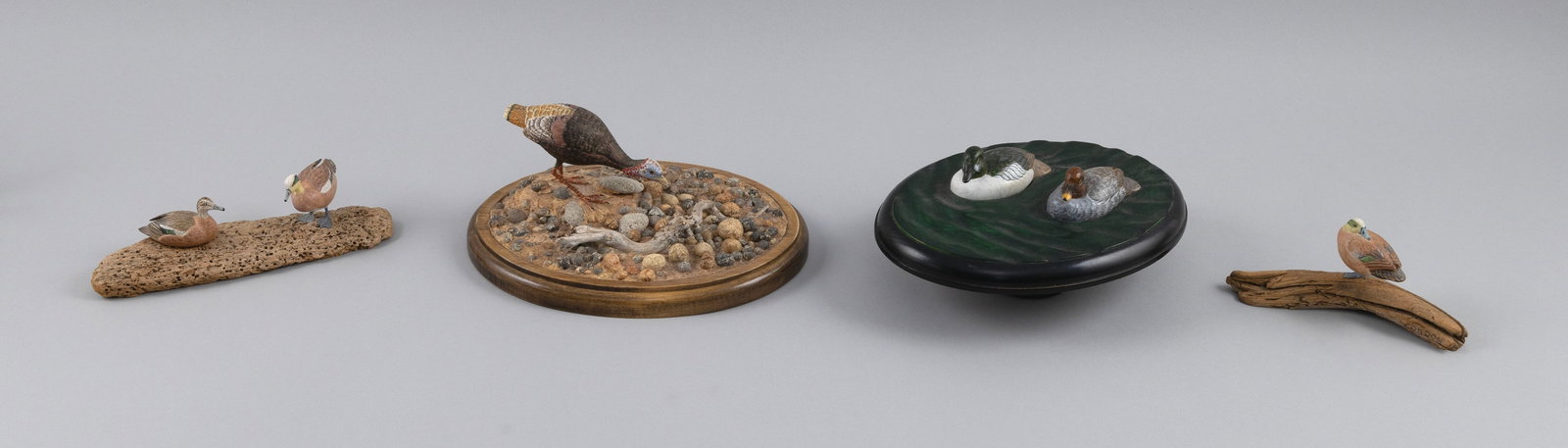 SIX ROSCOE A. CONDON MINIATURE BIRD CARVINGS Fitchburg, Massachusetts, 1935-2025 Lengths from 6" to: SIX ROSCOE A. CONDON MINIATURE BIRD CARVINGS Fitchburg, Massachusetts, 1935-2025 1) Turkey. 2-3) Pair of baldpates. 4) Baldpate. 5-6) Pair of goldeneyes. Lengths from 6" to 9".