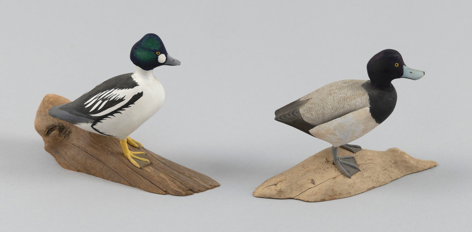 TWO HAROLD GIBBS MINIATURE DUCK CARVINGS Barrington, Rhode Island, 1866-1970 Heights 3". (1 of 5)