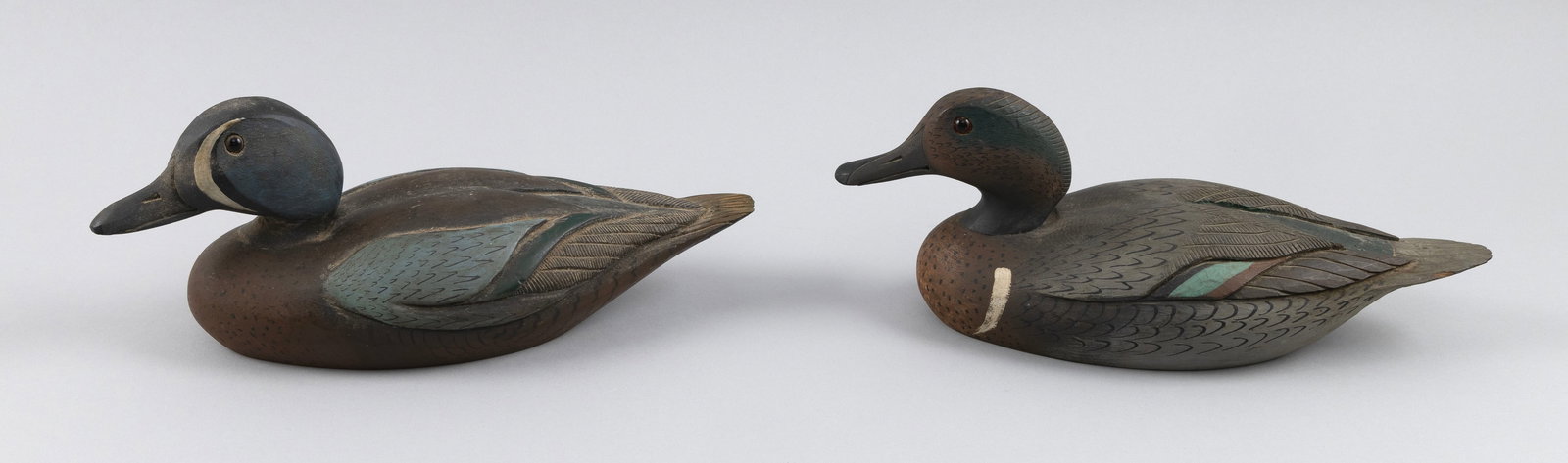 TWO ARMAND LAMONTAGNE TEAL DECOYS Rhode Island, 1939-2025 Lengths 11.5" and 12". (1 of 5)
