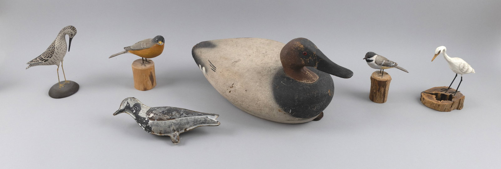 COLLECTION OF WATERFOWL DECOYS AND CARVINGS 20th Century Heights from 4" to 7". (1 of 3)
