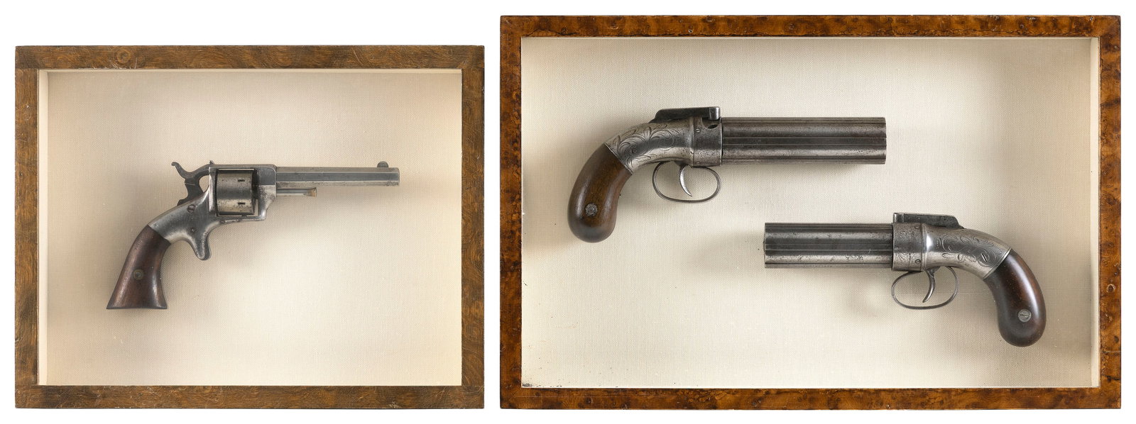 THREE ANTIQUE FIREARMS MOUNTED IN SHADOW BOXES 19th Century Firearm lengths 7" and 8".: THREE ANTIQUE FIREARMS MOUNTED IN SHADOW BOXES 19th Century One shadow box with a Prescott revolver and the other with two pepperboxes. Firearm lengths 7" and 8".