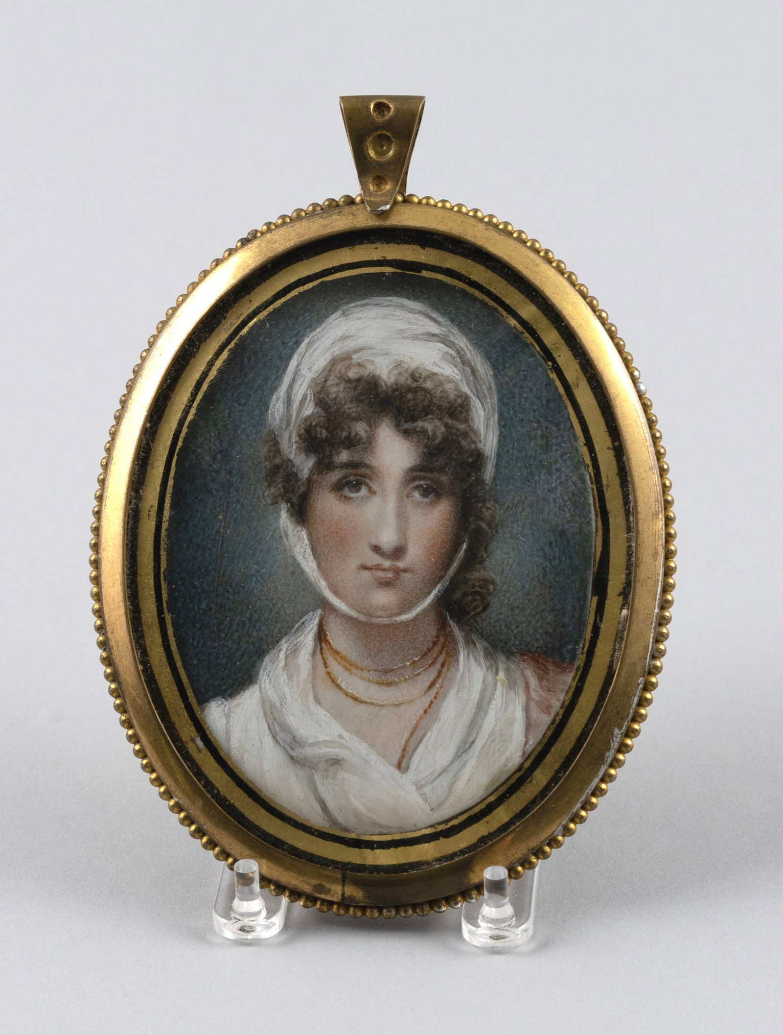 PORTRAIT MINIATURE ON IVORY OF A YOUNG WOMAN 19th Century Framed 3.75" x 3.25".: PORTRAIT MINIATURE ON IVORY OF A YOUNG WOMAN 19th Century Unsigned. Framed 3.75" x 3.25". Provenance: The Estate of Paul and Diane Madden, Sandwich, Massachusetts.
