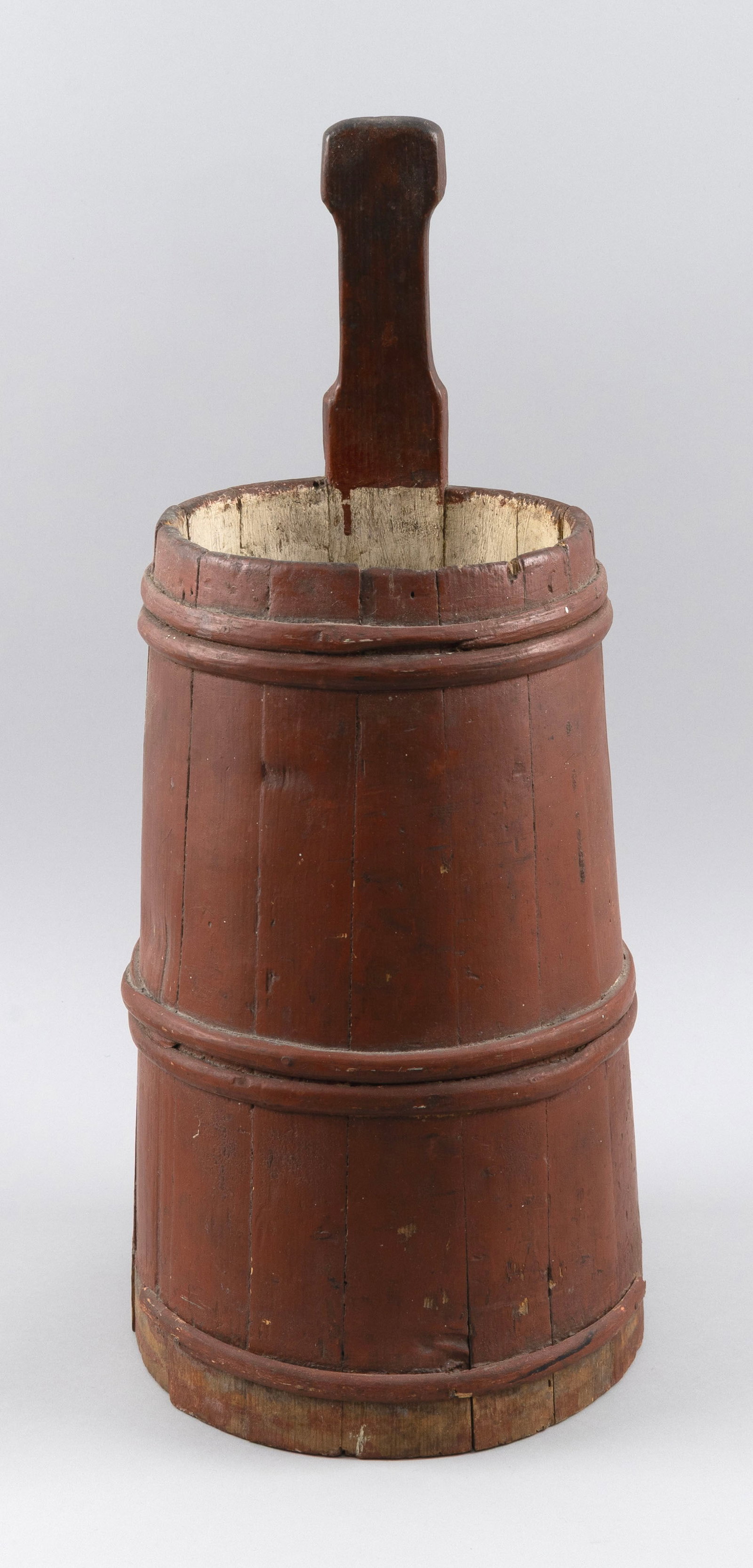 RED-PAINTED PIGGIN First Half of the 19th Century Height 21.5". Maximum diameter 10".: RED-PAINTED PIGGIN First Half of the 19th Century Height 21.5". Maximum diameter 10". Provenance: The Estate of Paul and Diane Madden, Sandwich, Massachusetts.