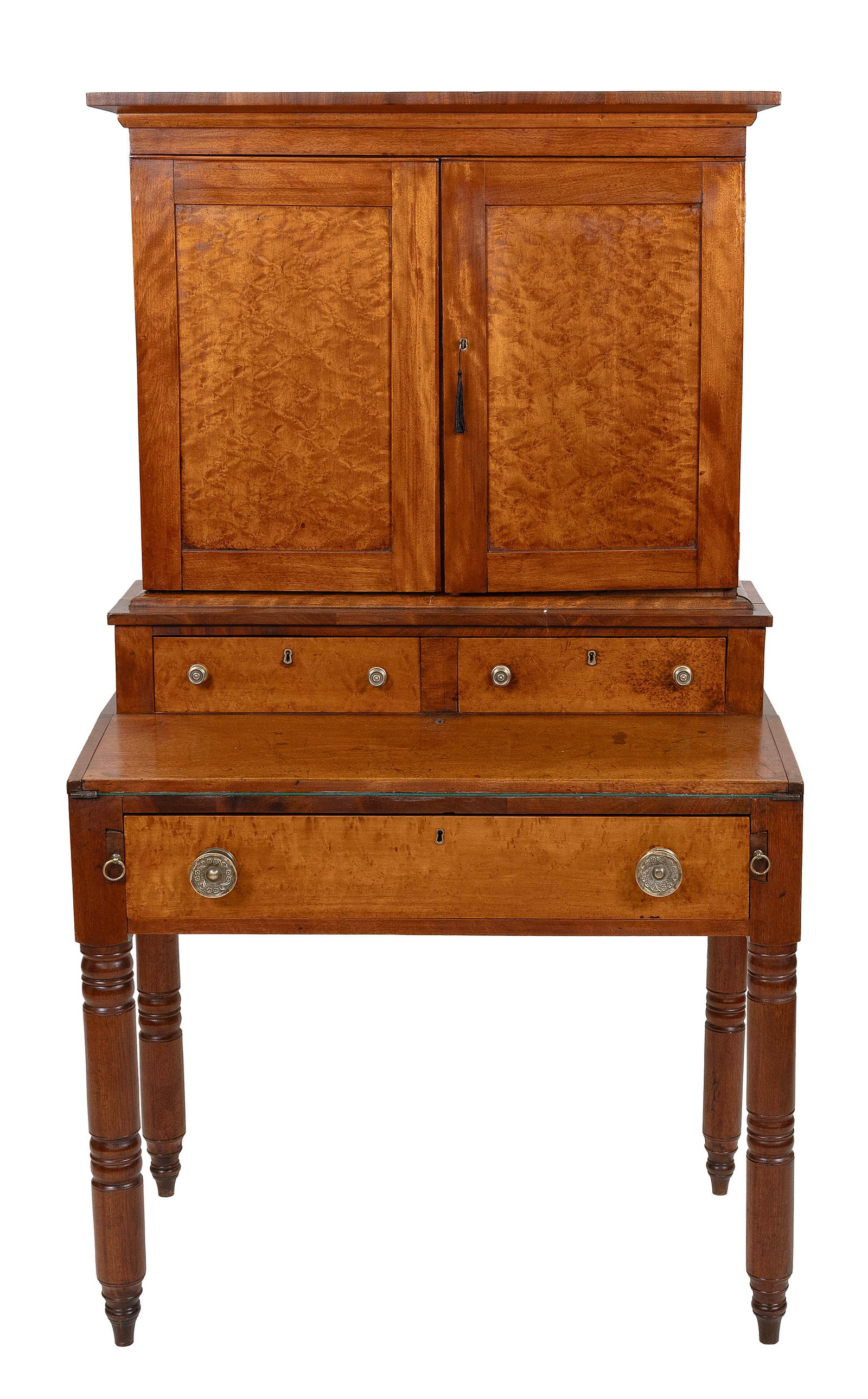 SHERATON FIGURED MAPLE TWO-PART SECRETARY 19th Century Height 63". Width 36". Depth 23".: SHERATON FIGURED MAPLE TWO-PART SECRETARY 19th Century Upper case with two paneled doors enclosing shelves and small compartments. Lower case with recessed half drawers, a fold-out writing surface, a 