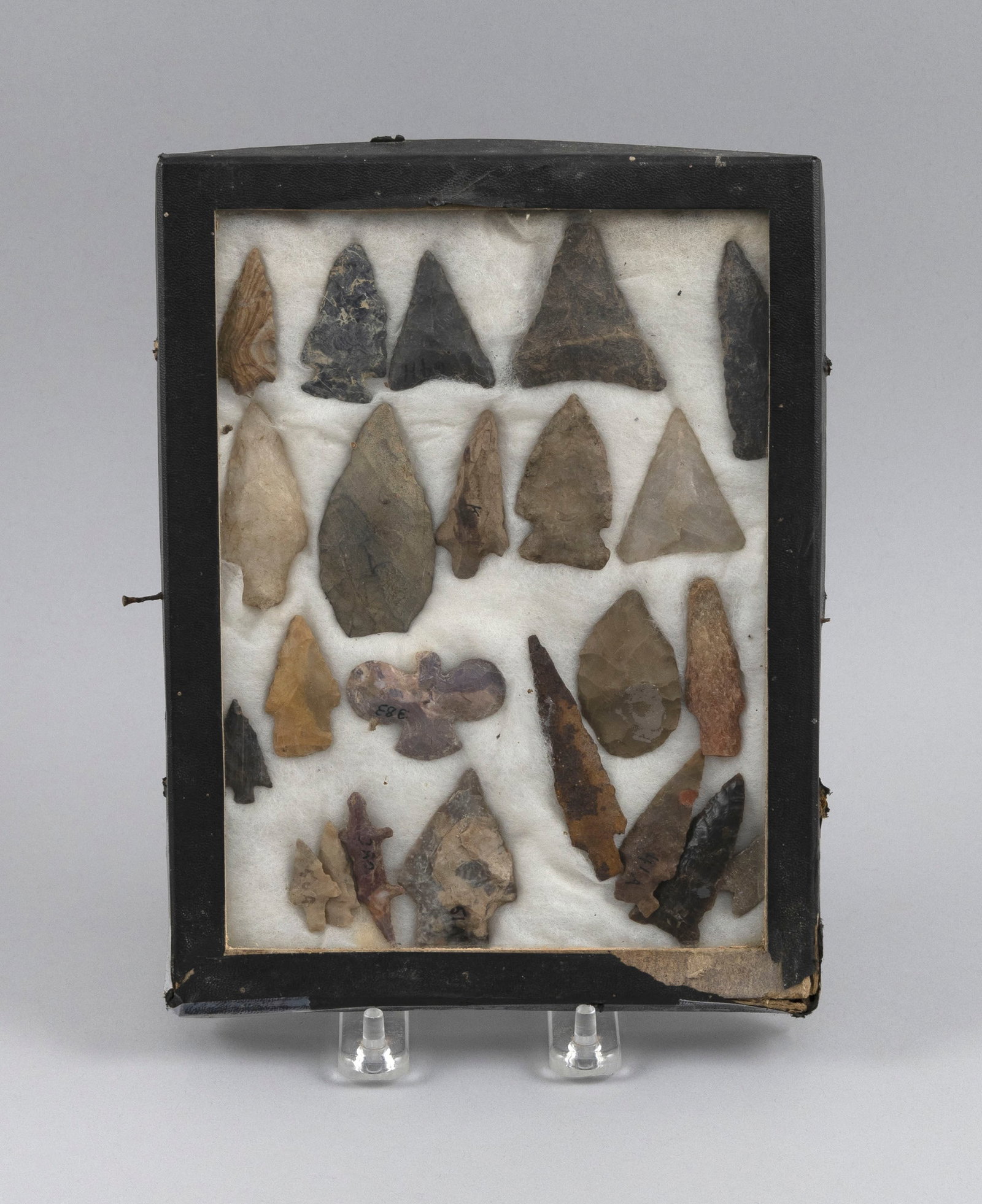 COLLECTION OF NATIVE AMERICAN POINTS, FETISHES AND PENDANTS 9" x 7". (1 of 2)