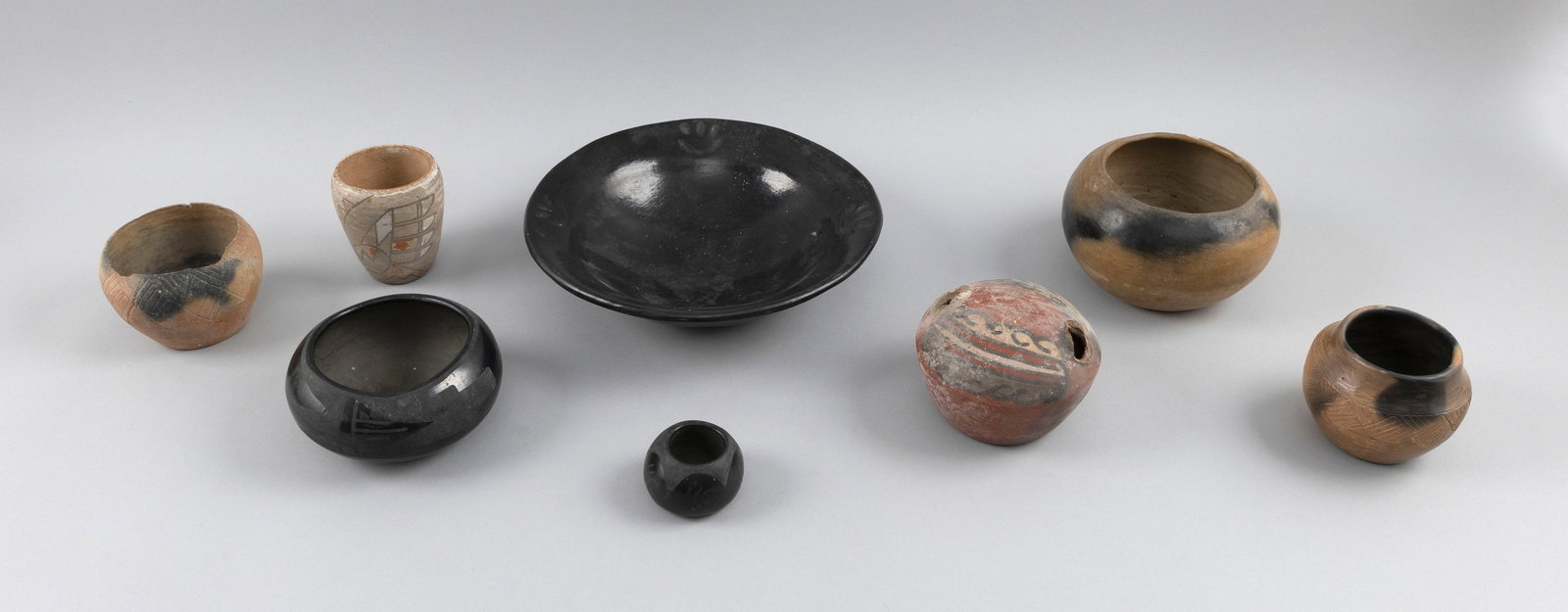 EIGHT PIECES OF NATIVE AMERICAN POTTERY 19th/20th Century Heights from 1.5" to 4". (1 of 3)