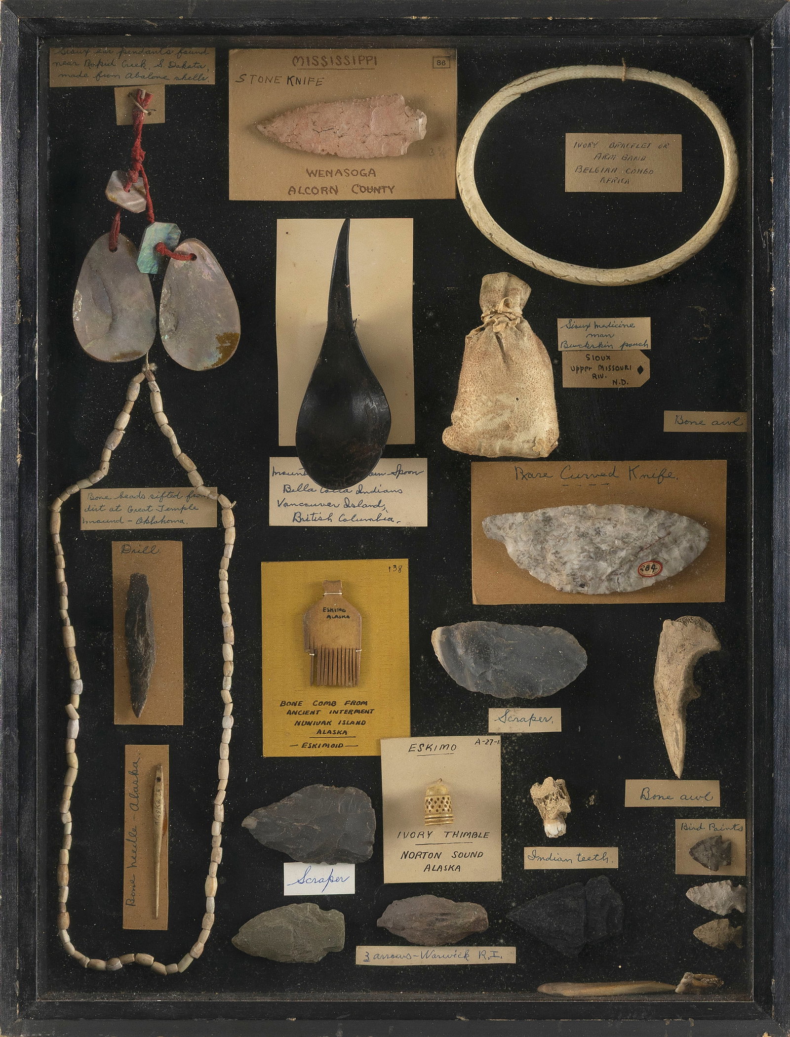NATIVE AMERICAN AND ESKIMO ARTIFACTS MOUNTED IN A SHADOW BOX 19th and 20th Centuries Shadow box 21" (1 of 2)