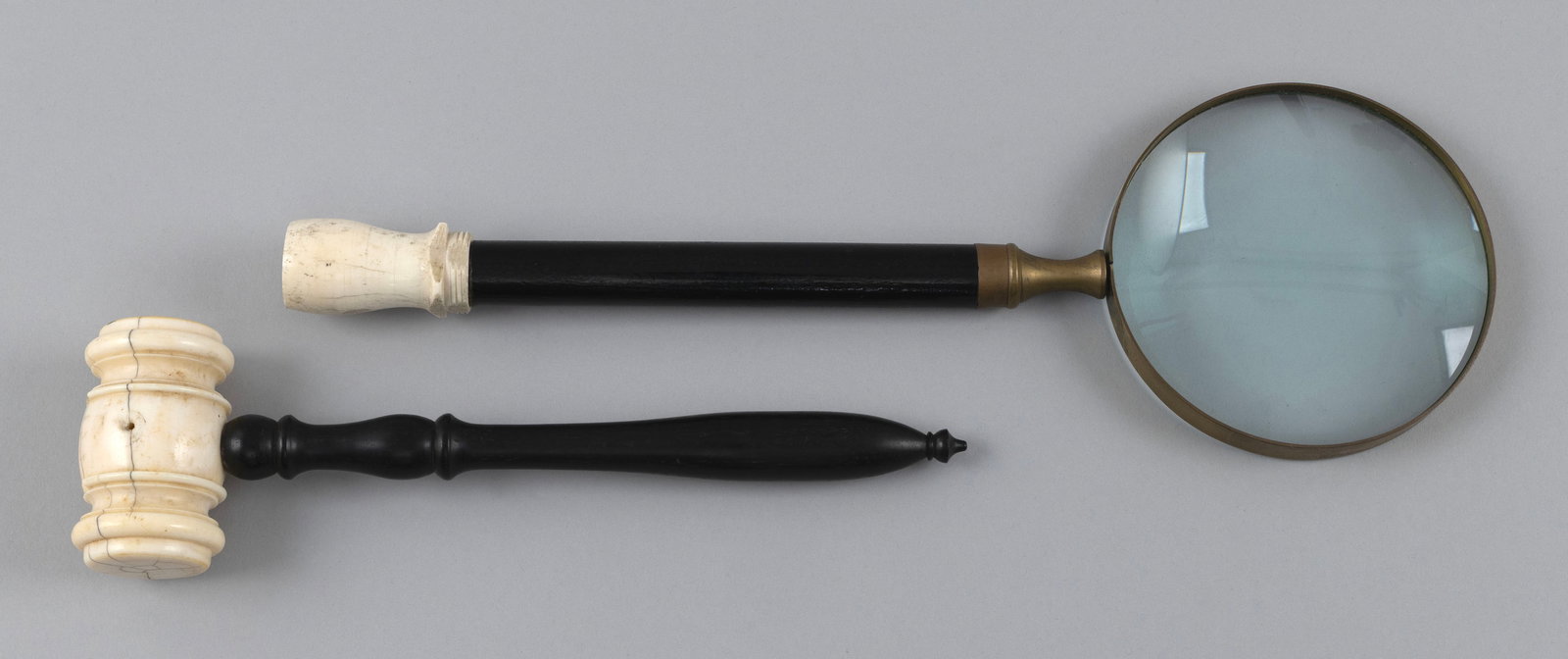 TWO WOOD AND IVORY UTILITARIAN ITEMS 19th Century Lengths 9" and 12.5".: TWO WOOD AND IVORY UTILITARIAN ITEMS 19th Century A magnifying glass and a gavel. Lengths 9" and 12.5".