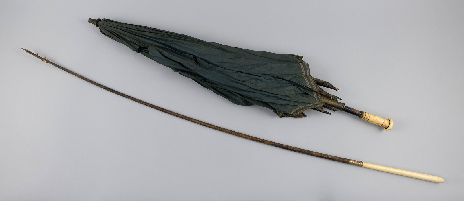 A PARASOL AND A BUGGY WHIP 19th Century Buggy whip length 51.25". (1 of 1)