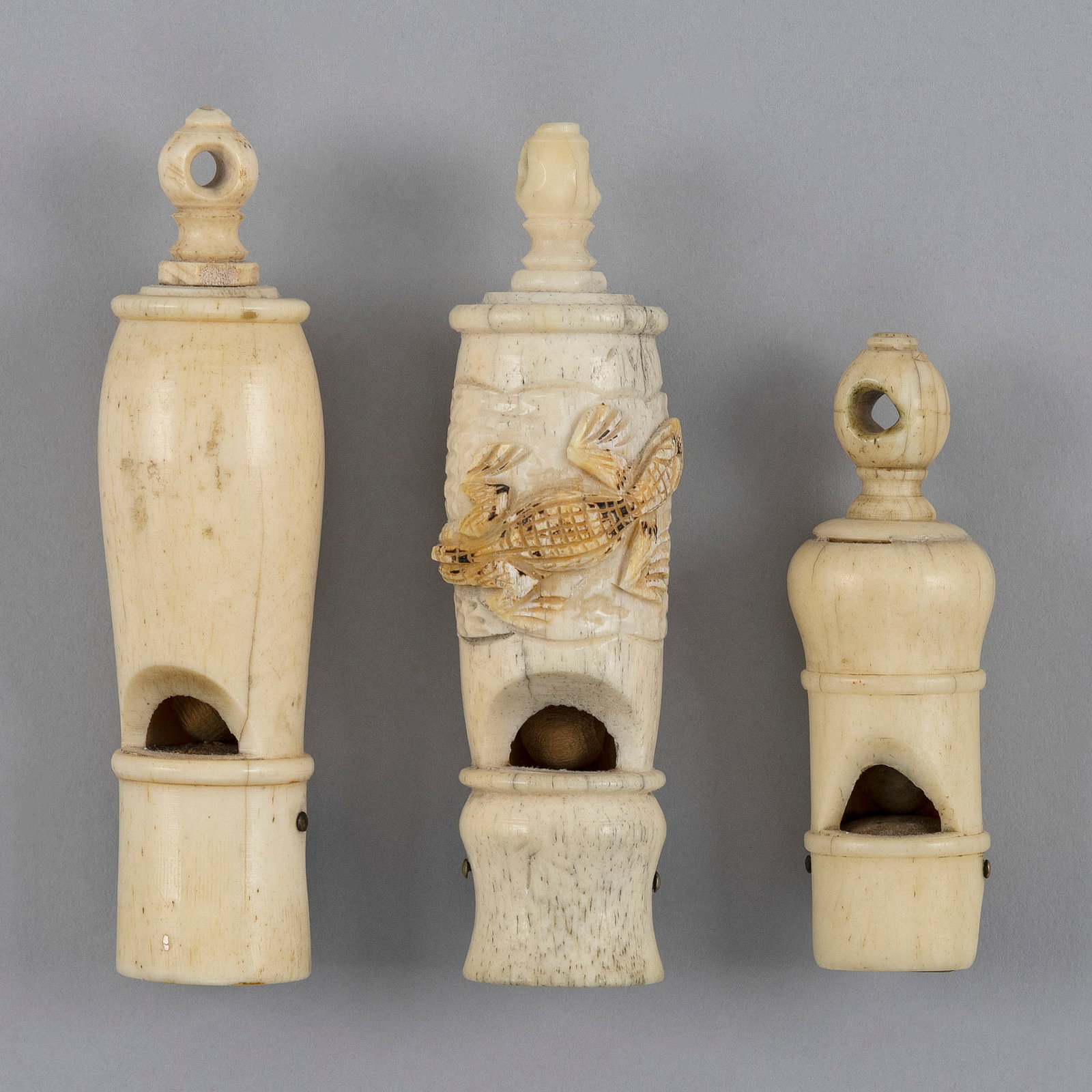 THREE CARVED BONE WHISTLES Late 19th Century Lengths from 2.75" to 3.75". (1 of 5)