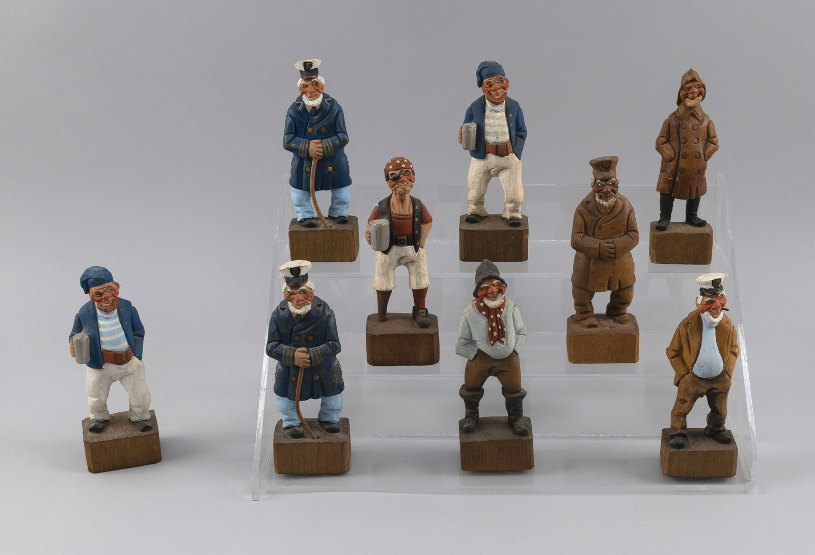 ARMAND LAMONTAGNE (Rhode Island, 1939-2025), Nine carved wooden maritime figures:, Heights from 6.5" (1 of 5)