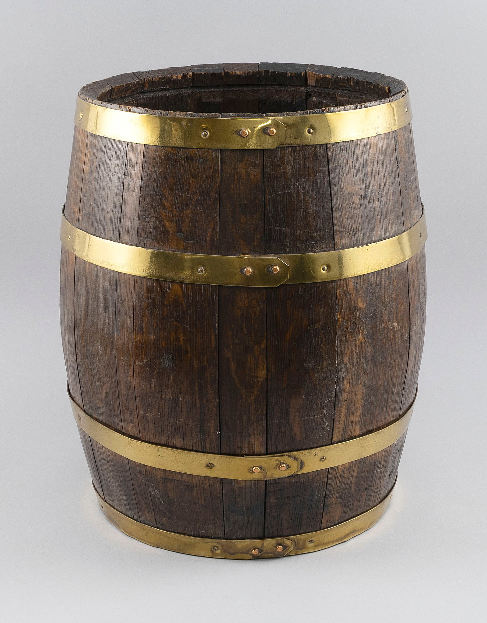 SMALL BRASS-BOUND OAK CASK Probably England, 19th Century Height 17". Diameter approx. 14". (1 of 4)