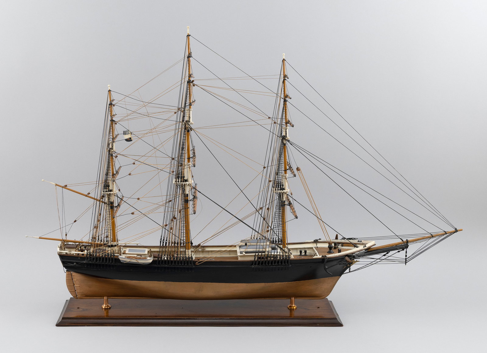 MODEL OF THE CLIPPER SHIP "SEA WITCH" 20th Century Height 24". Length 36".: MODEL OF THE CLIPPER SHIP "SEA WITCH" 20th Century Made by Raymond Pendleton (Westerly, Rhode Island, 1901-1989). Black hull with copper bottom. Displayed on brass pedestals on a mahogany base. Height