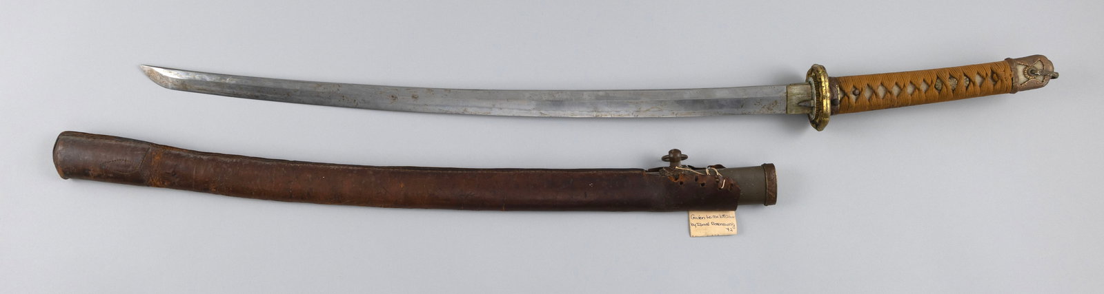 WORLD WAR II-ERA IMPERIAL JAPANESE ARMY SWORD Length of blade 28". Total length 38". (1 of 2)