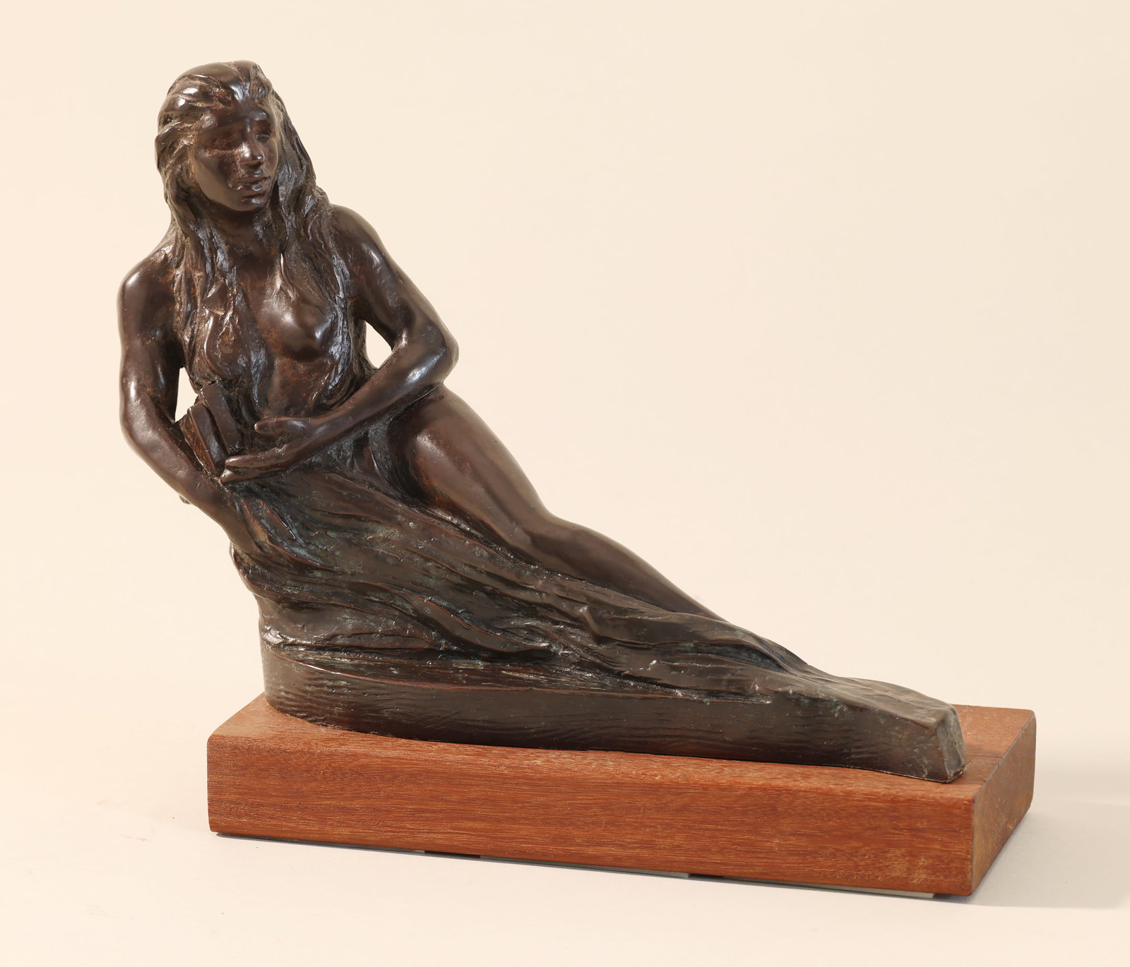 FRED X. BROWNSTEIN (Vermont, 1946-), River Flowing., Bronze, 8" x 6" x 3". On a wooden base. (1 of 3)