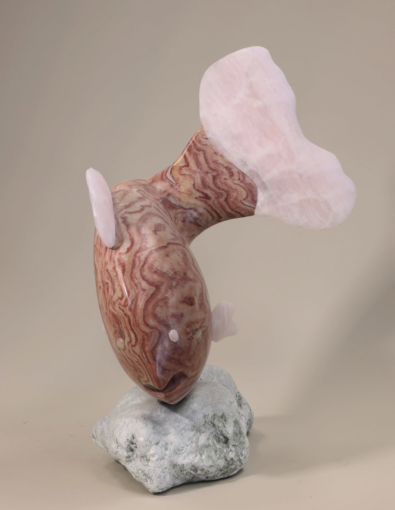 JESSE ENSLING (Massachusetts, Contemporary), Fancy Fish., Raspberry alabaster and pink onyx, 32" x: JESSE ENSLING Massachusetts, Contemporary Fancy Fish. Includes both a stone and wood base. Raspberry alabaster and pink onyx, 32" x 15" x 12".