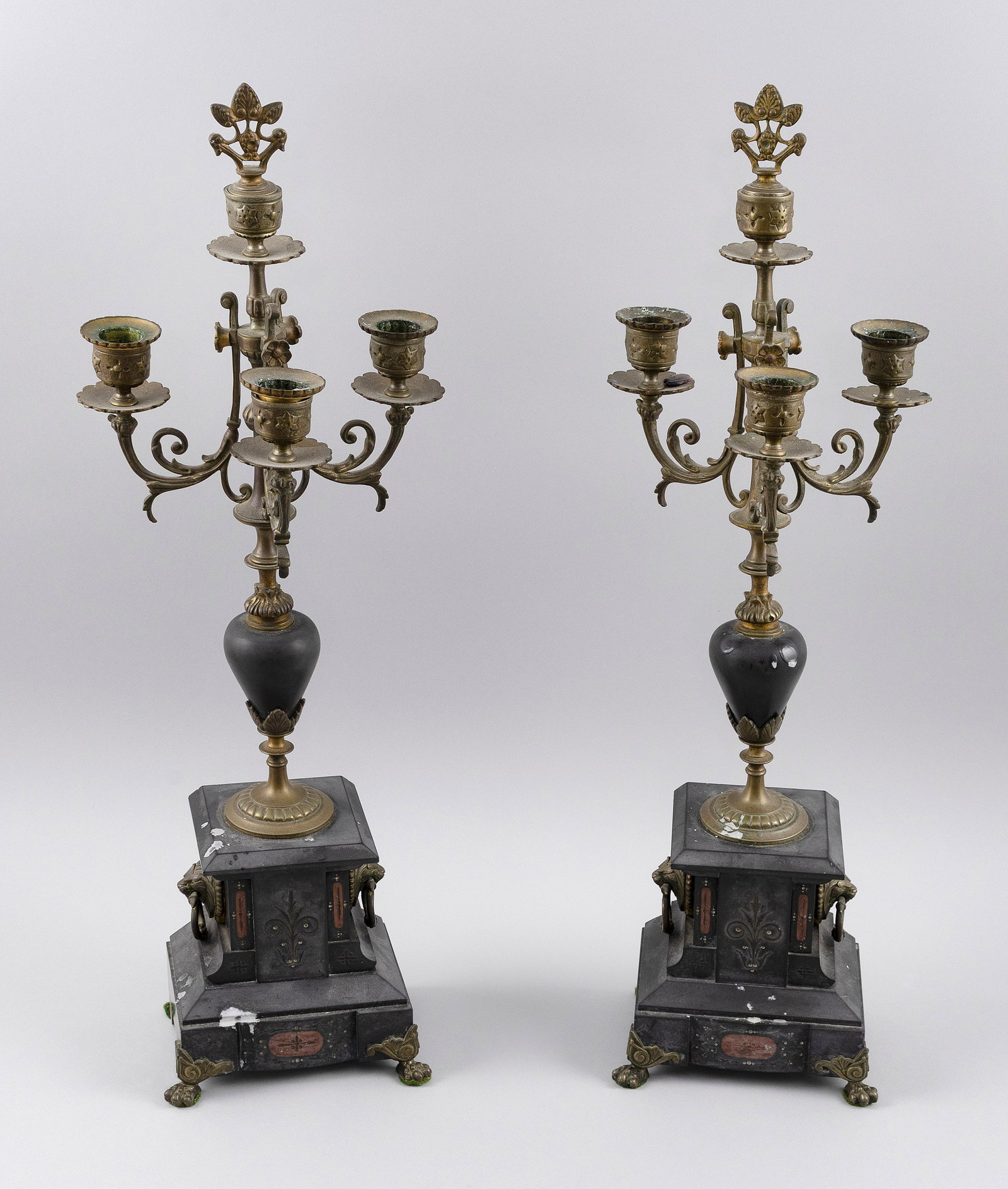 PAIR OF NAPOLEON III BRASS AND MARBLE CANDELABRA ATTRIBUTED TO HENRI PICARD France, 19th Century: PAIR OF NAPOLEON III BRASS AND MARBLE CANDELABRA ATTRIBUTED TO HENRI PICARD France, 19th Century Inlaid black and red slate stepped bases with ormolu mask and ring handles. Vasiform stem supports thre