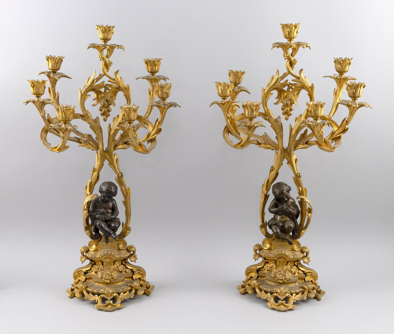 PAIR OF FRENCH GILT-BRONZE PUTTI CANDELABRA Late 19th Century Heights 25.5". Widths 14". (1 of 5)