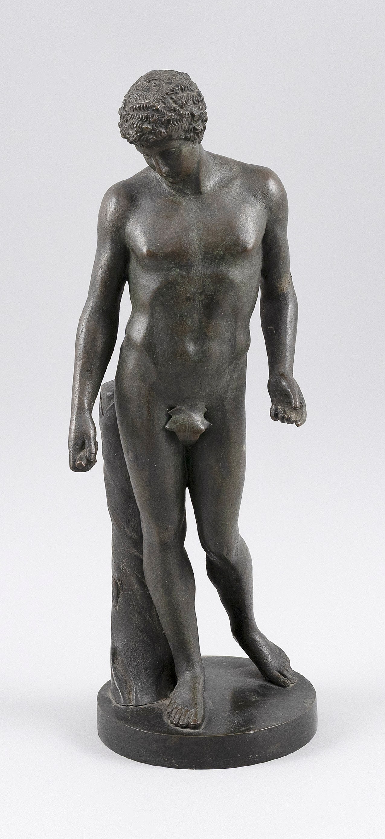 GRAND TOUR BRONZE OF DIONYSUS Continental Europe, 19th Century Height 13".: GRAND TOUR BRONZE OF DIONYSUS Continental Europe, 19th Century Nude figure standing beside a tree stump. Unmarked. Height 13".
