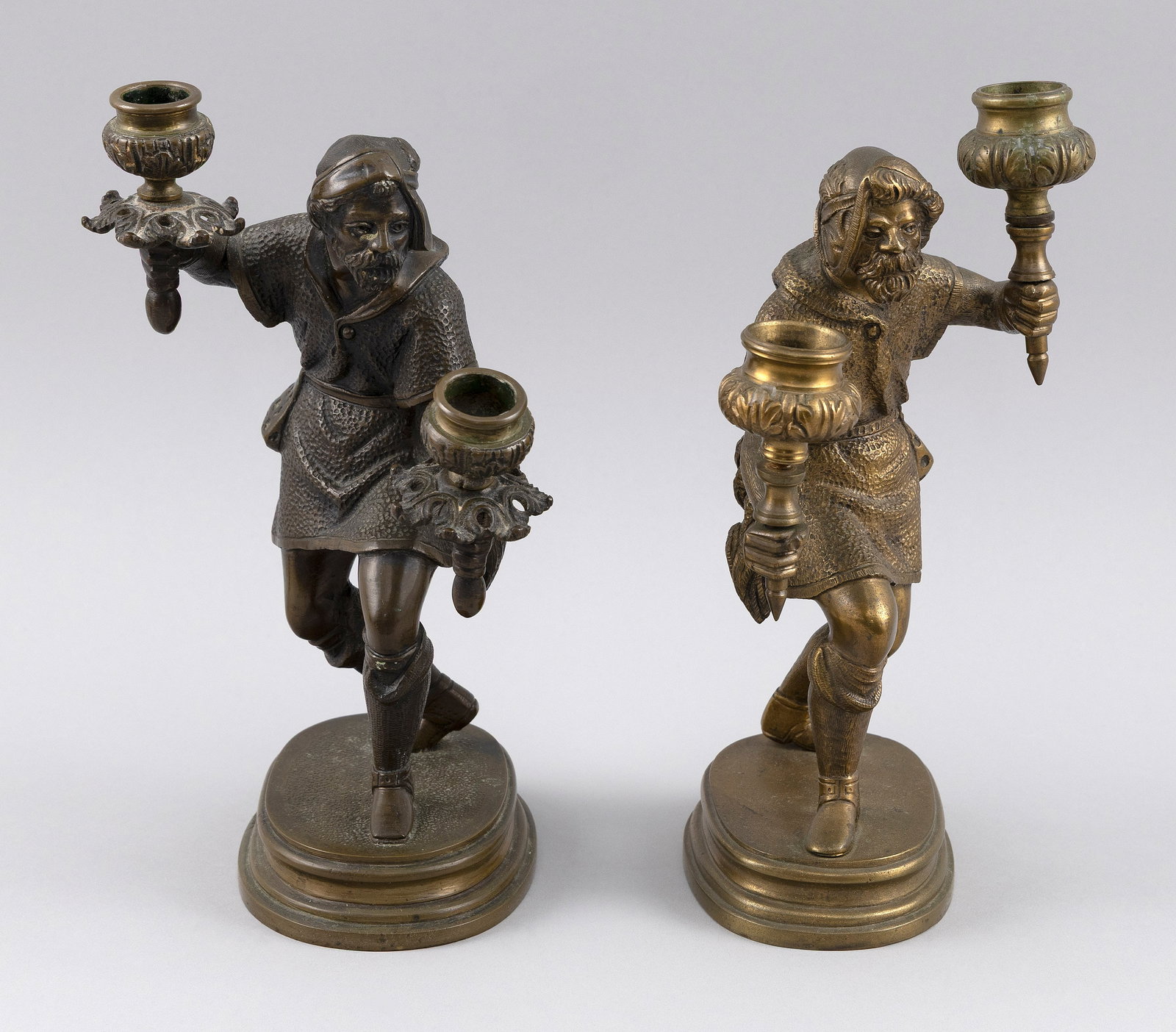 NEAR-PAIR OF GRAND TOUR BRONZE FIGURAL CANDLEHOLDERS Continental European, Late 19th Century Heights: NEAR-PAIR OF GRAND TOUR BRONZE FIGURAL CANDLEHOLDERS Continental European, Late 19th Century Unmarked. Heights 10".